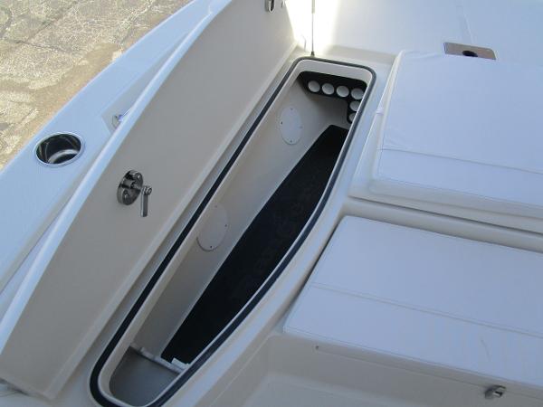 2024 Ranger 2660 Bay boat storage compartment with cushioned seating.