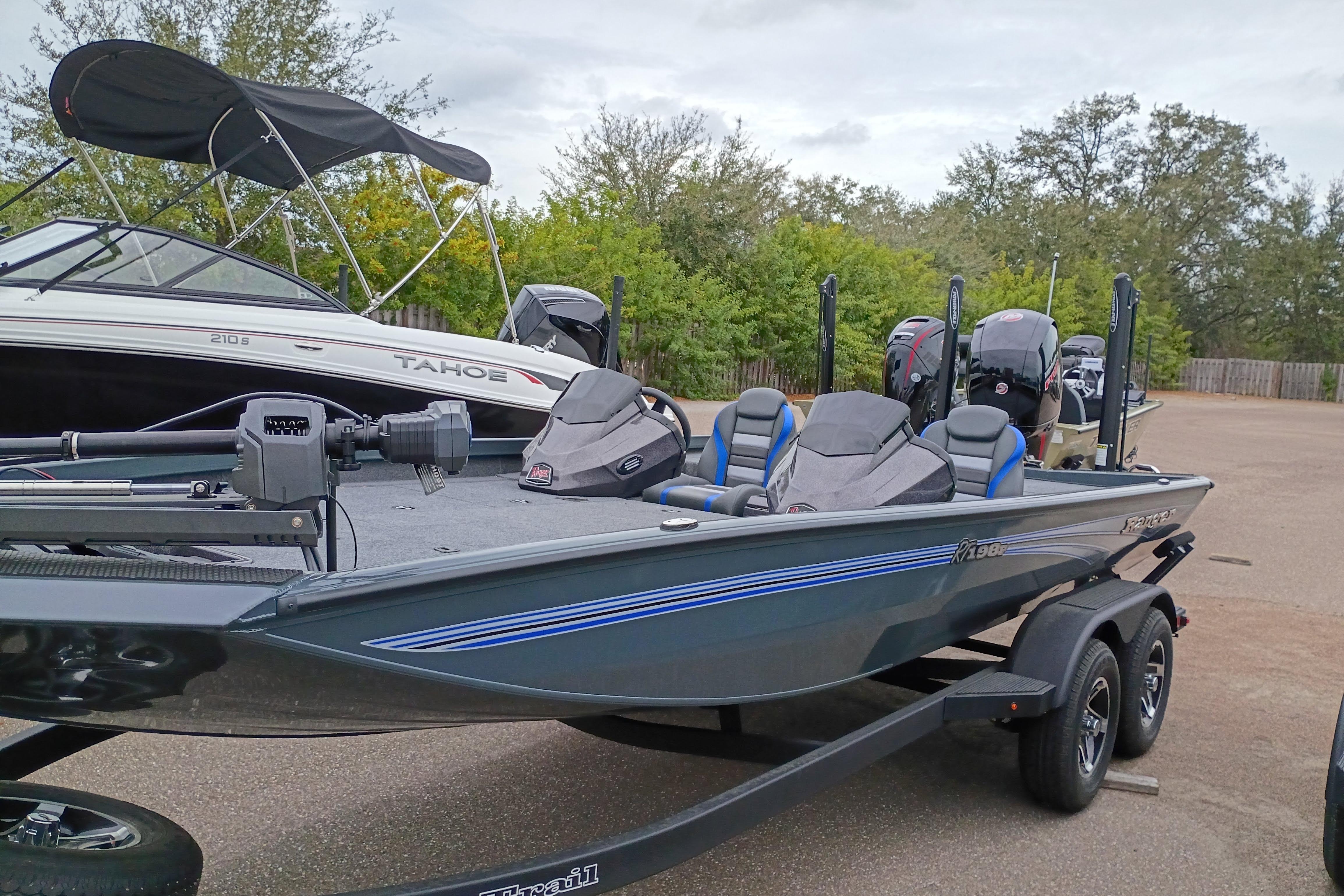 2026 Ranger RT198P fishing boat on trailer, parked outdoors.