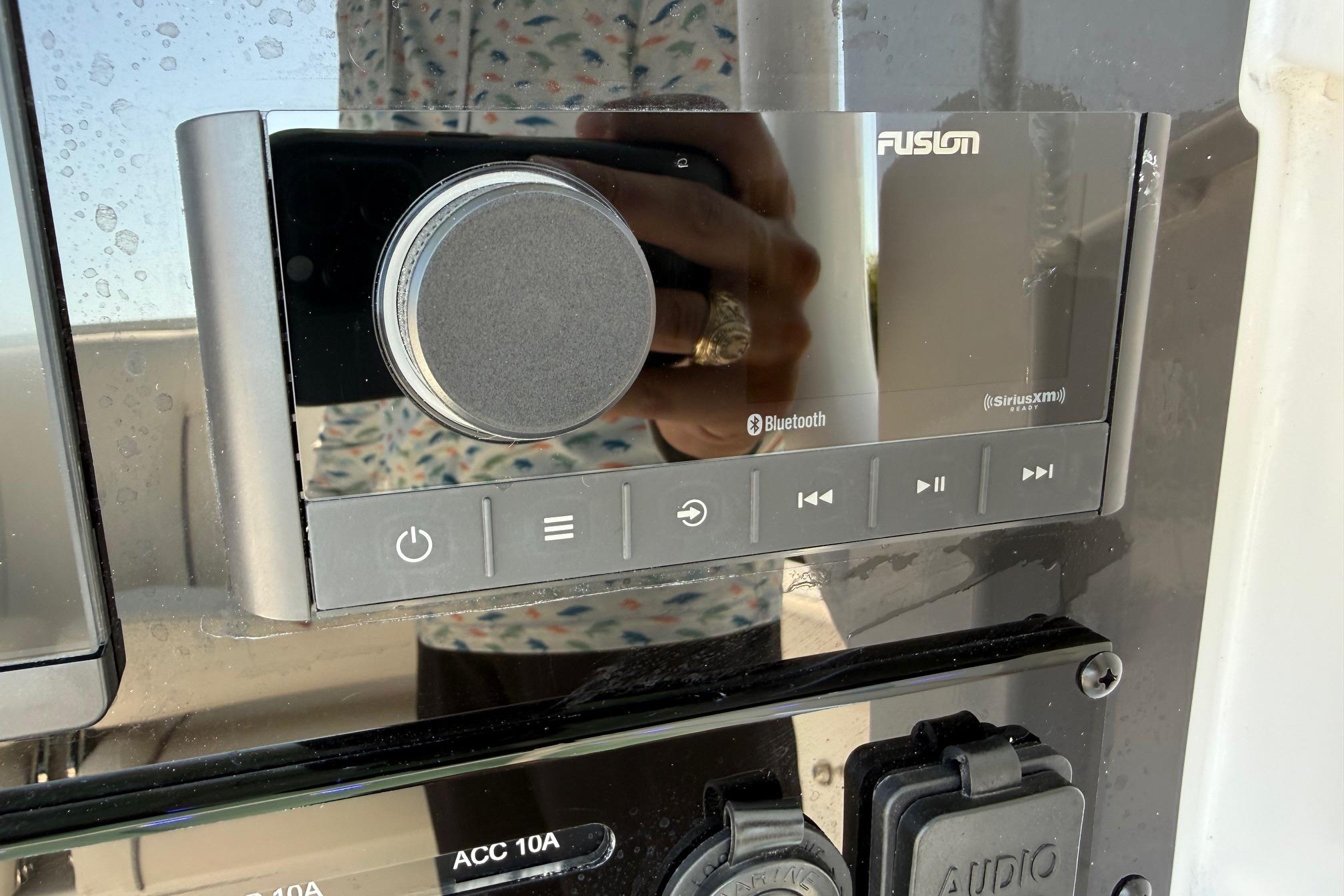 Fusion audio system on 2026 Sea Hunt Ultra 255 SE boat dashboard.