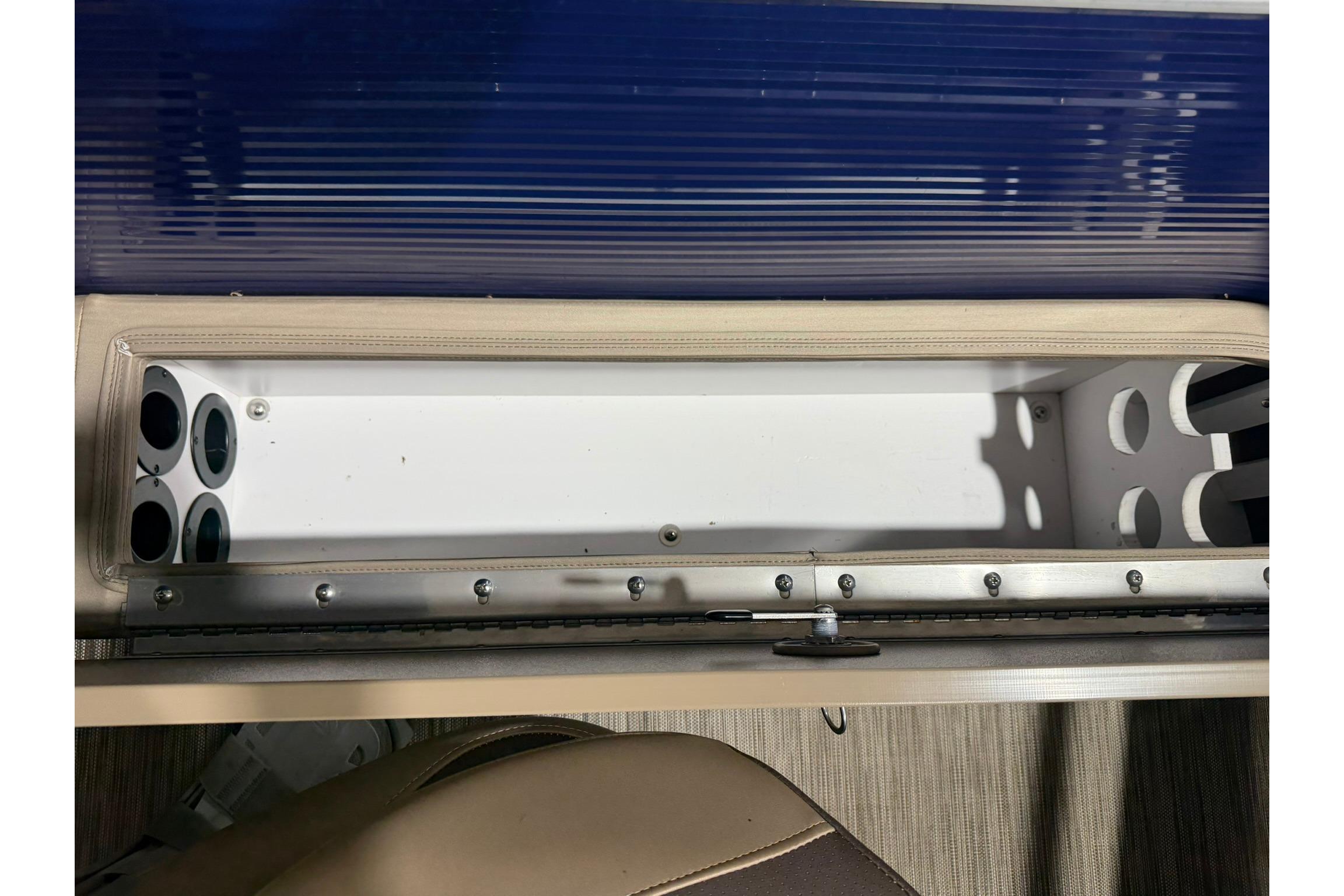 Interior view of a 2020 Bennington SX 22 SFX boat storage compartment.