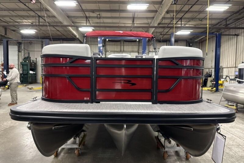 2026 Bennington 22 SSRSF pontoon boat in a warehouse setting.
