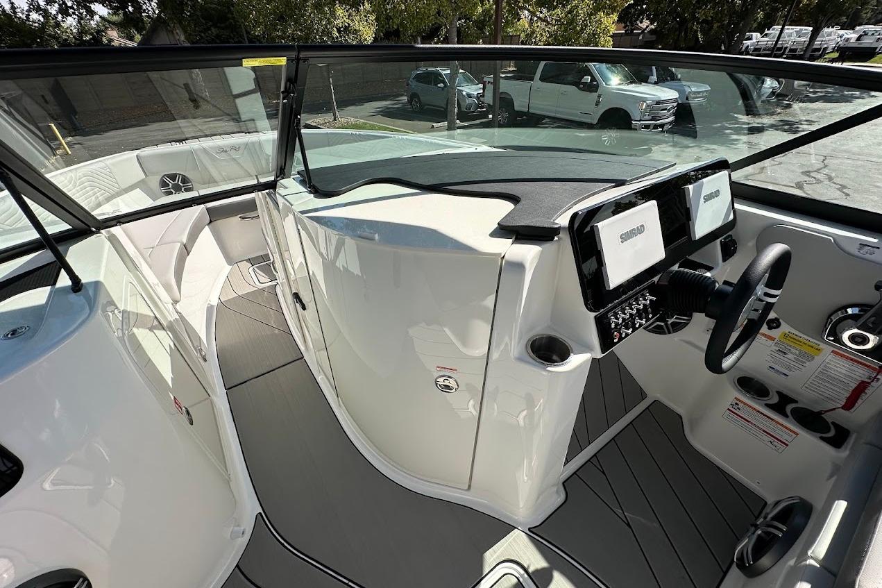 2026 Sea Ray SDX 230 Surf boat interior with modern dashboard and seating.