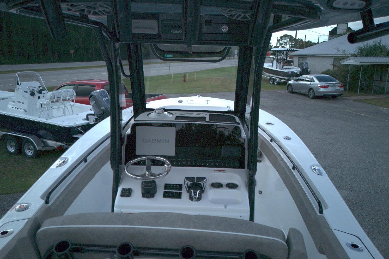2026 Sea Hunt Gamefish 25 boat interior with Garmin navigation system.