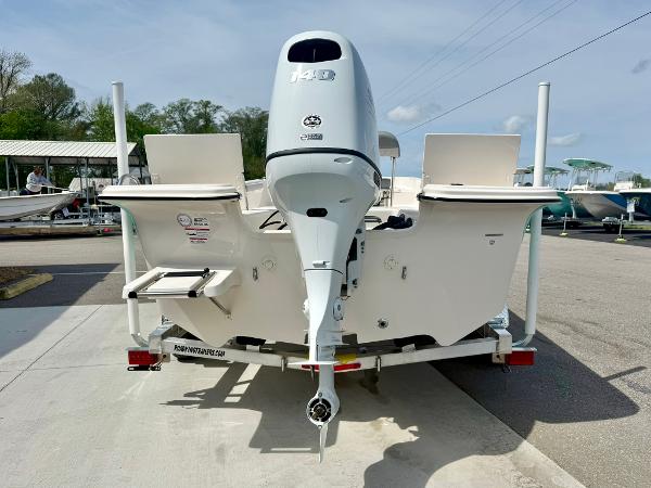 2025 Carolina Skiff 21 LS boat on trailer, rear view with outboard motor.