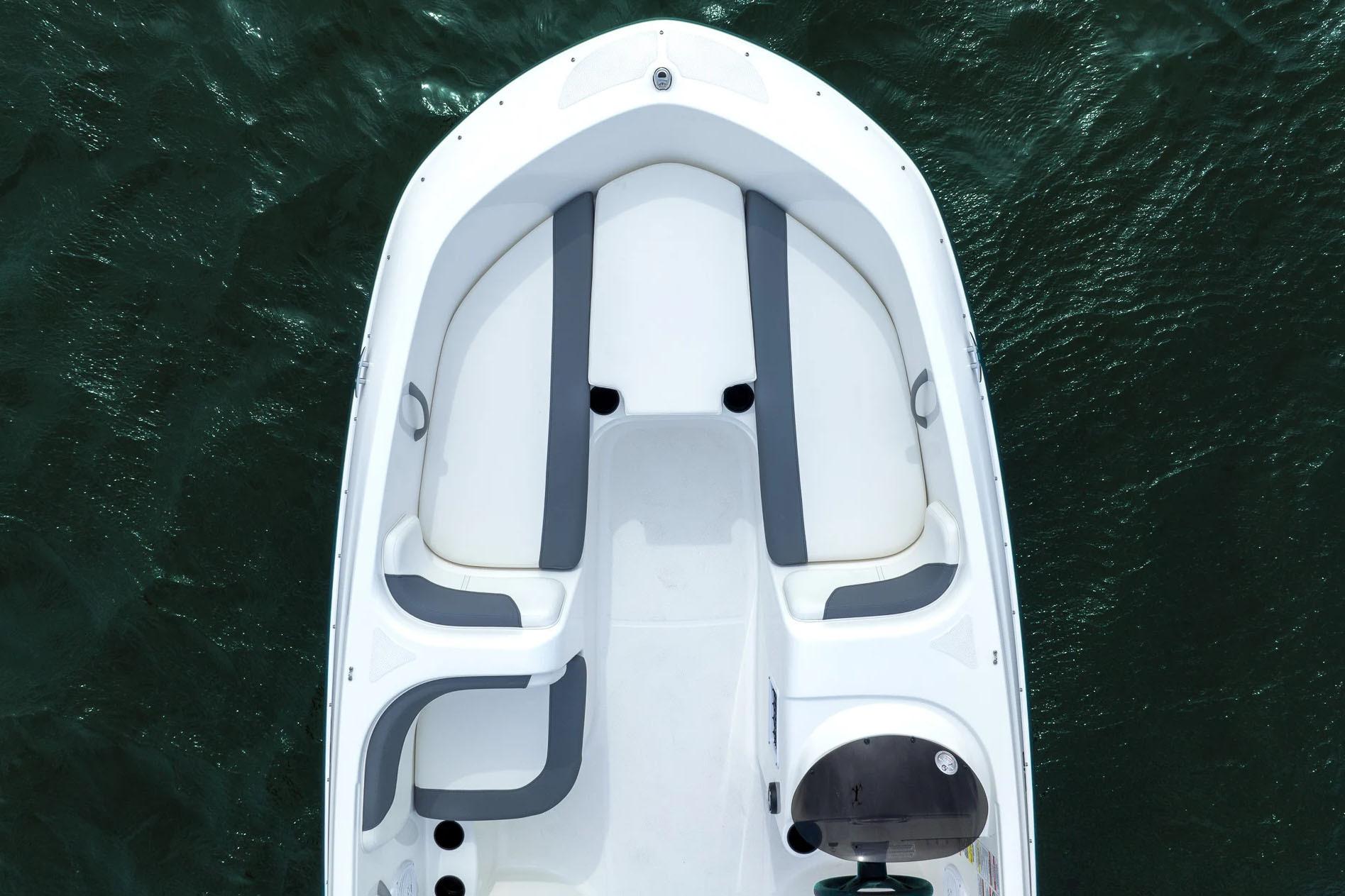 Manufacturer Provided Image: 2025 Bayliner Element E18 boat, aerial view, white and gray seating, on water.