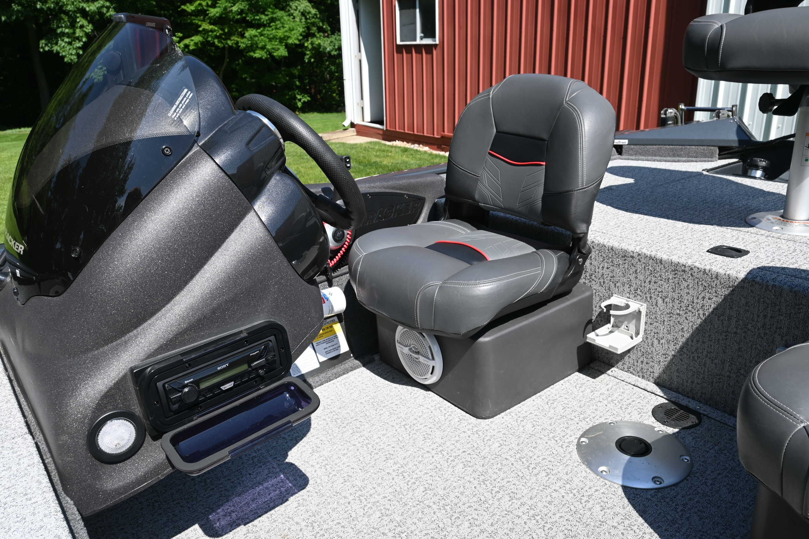 2022 Tracker Pro 175 TF: Helm with gray seat and dashboard.