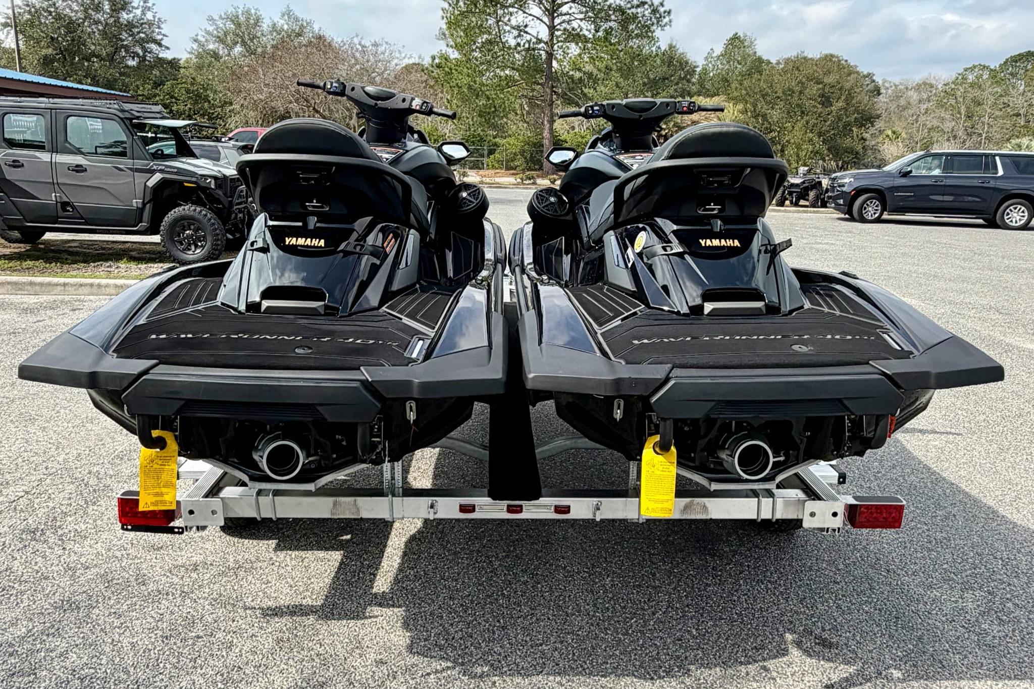 2026 Yamaha WaveRunner FX Limited SVHO jet skis on a trailer, parked outdoors.