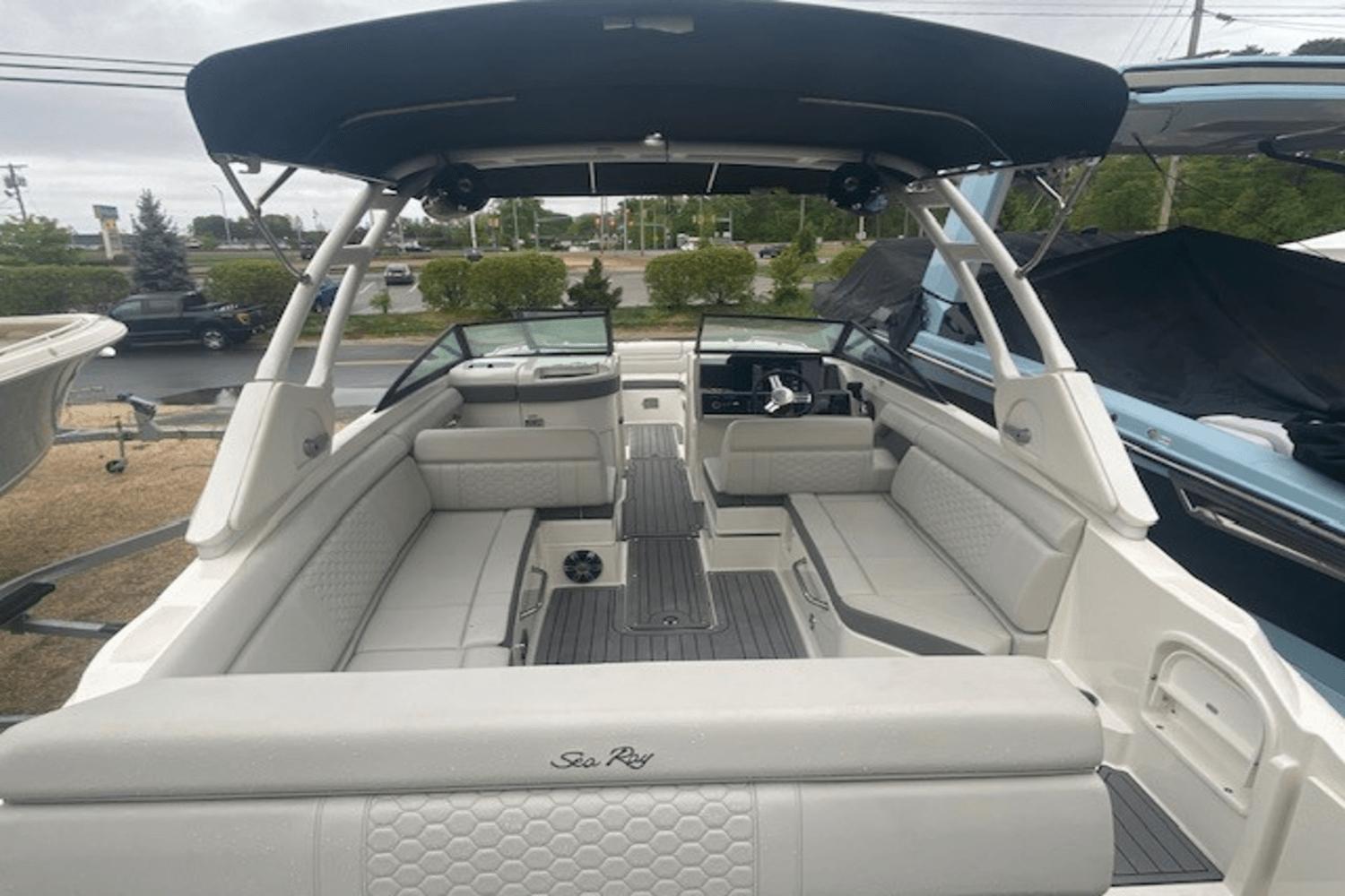 2021 Sea Ray SDX 270 boat interior with spacious seating and sleek design.