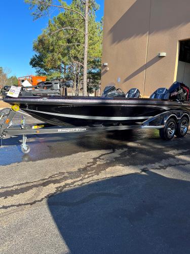 2024 Ranger Z521R Ranger Cup Equipped boat on trailer outside building.