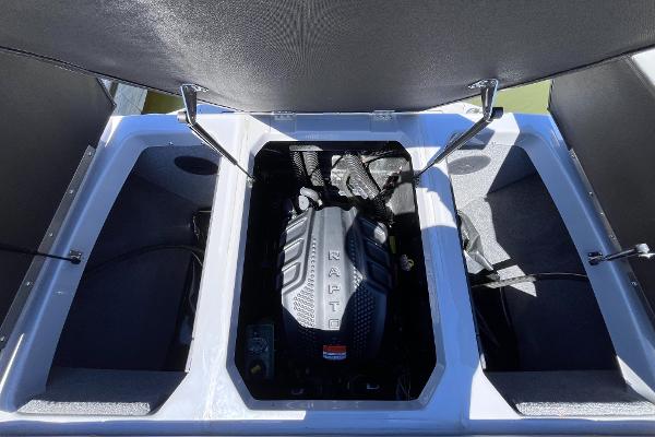 2024 Moomba Max engine compartment with Raptor engine, open storage hatches.