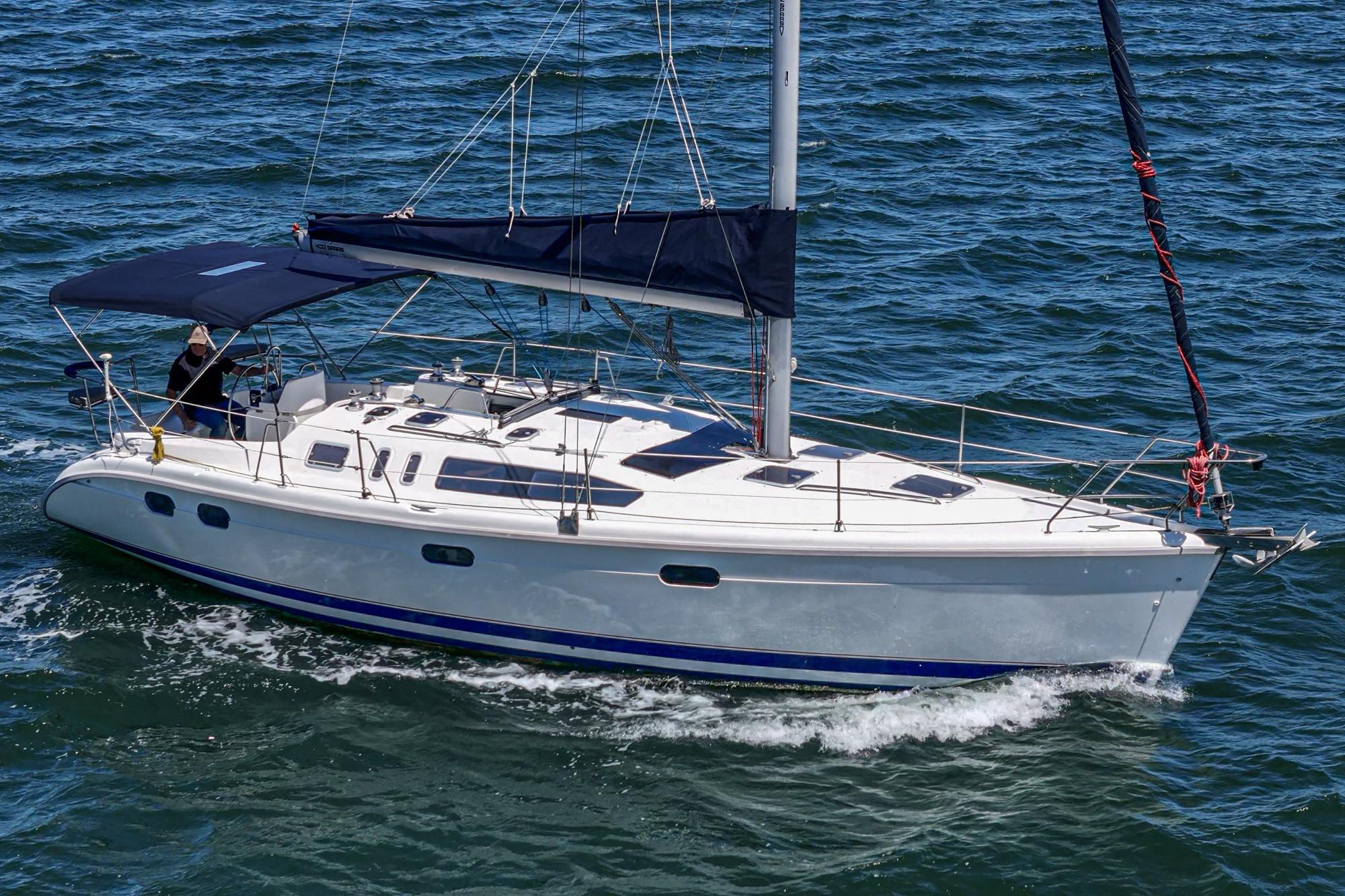 Sailing yacht Hunter 376, 1996 model, cruising on open water.