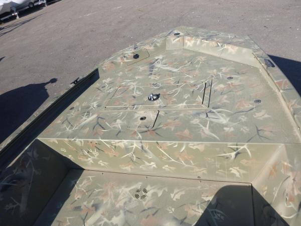 2024 Tracker Grizzly 1648 SC boat with camouflage design on deck.