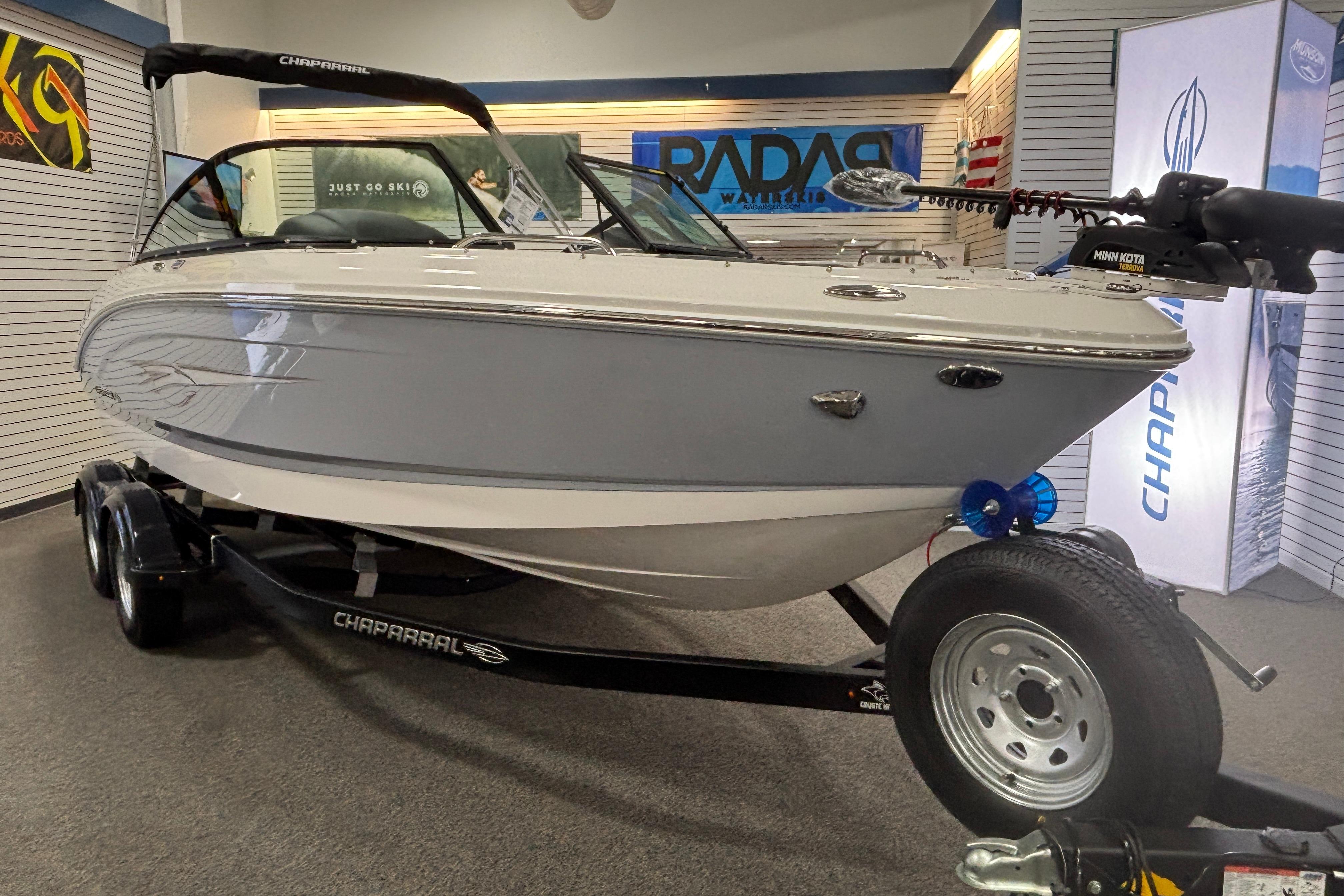 2026 Chaparral 21 SSi Ski & Fish boat in showroom.
