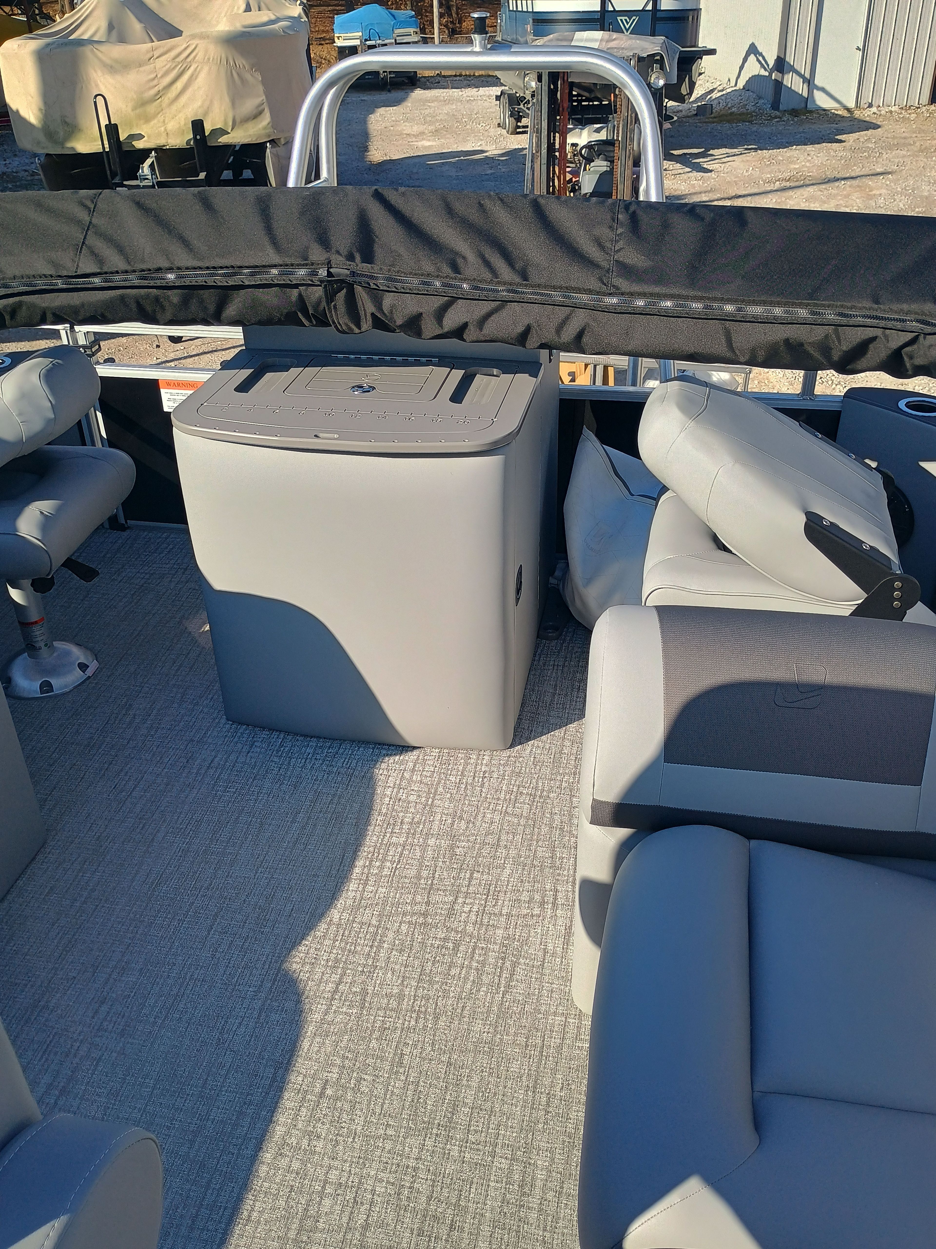 Interior of 2026 Landau Alure 25CC Fish-Black with gray seating.