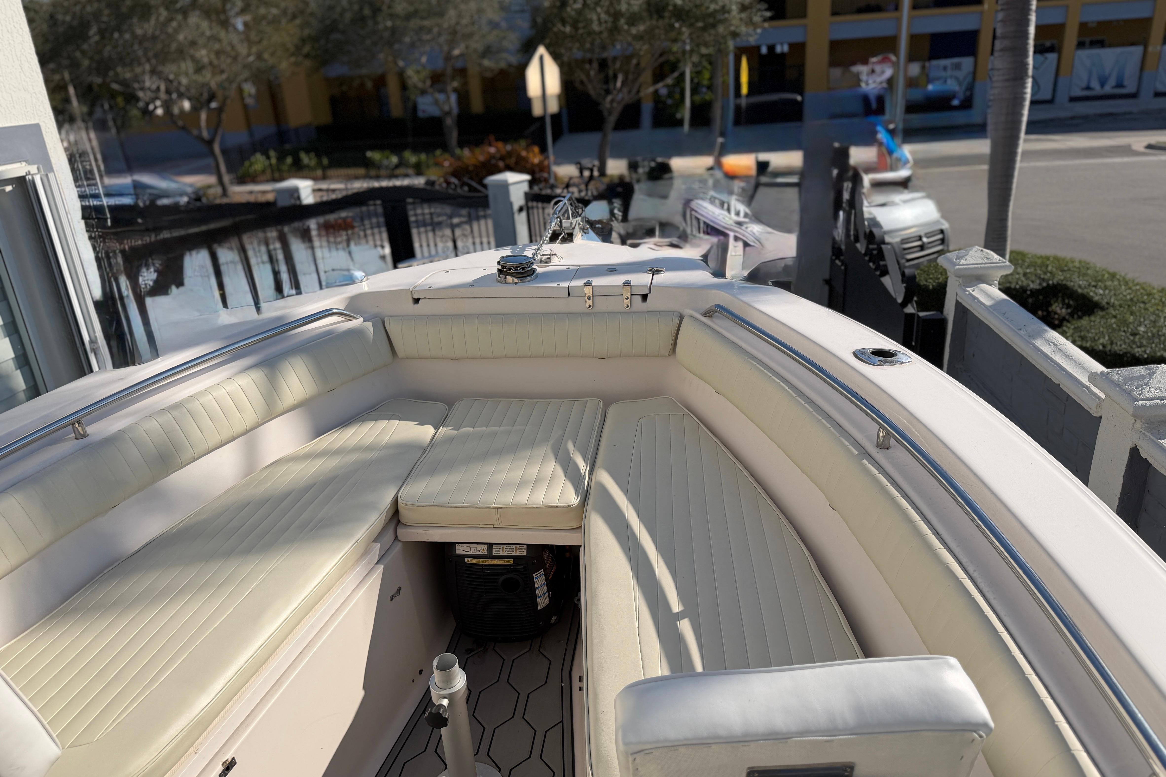 2004 Grady White 273 boat with spacious seating and sleek design.