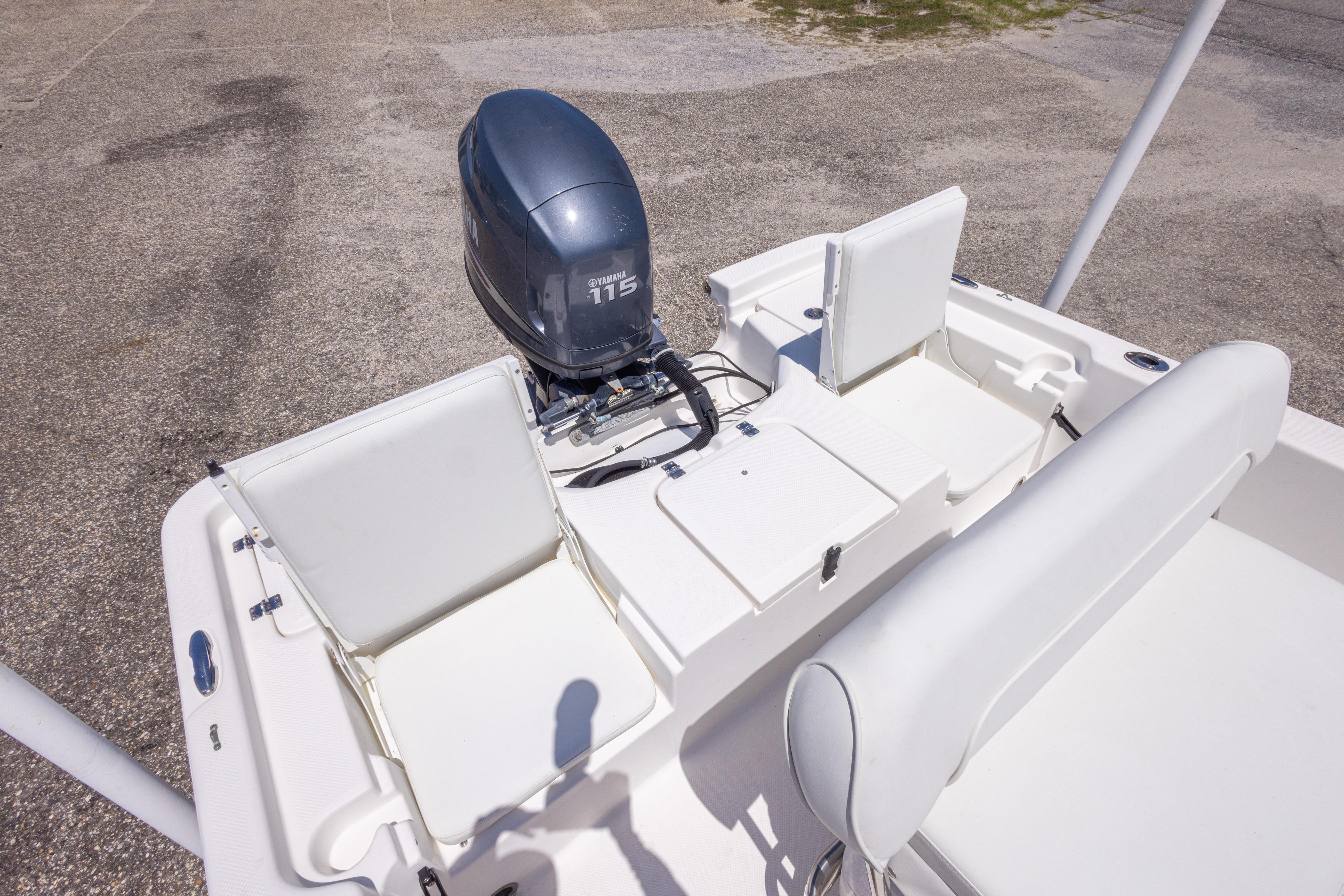 2011 Sea Fox 200XT boat with Yamaha 115 engine, featuring white seating and deck layout.