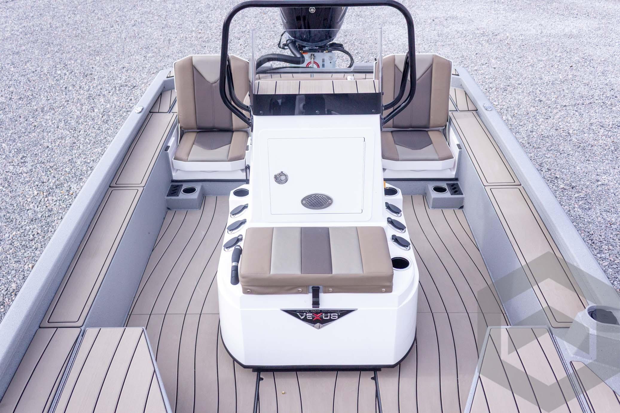 2026 Vexus ACX 2150 boat interior with seating and console, featuring modern design.