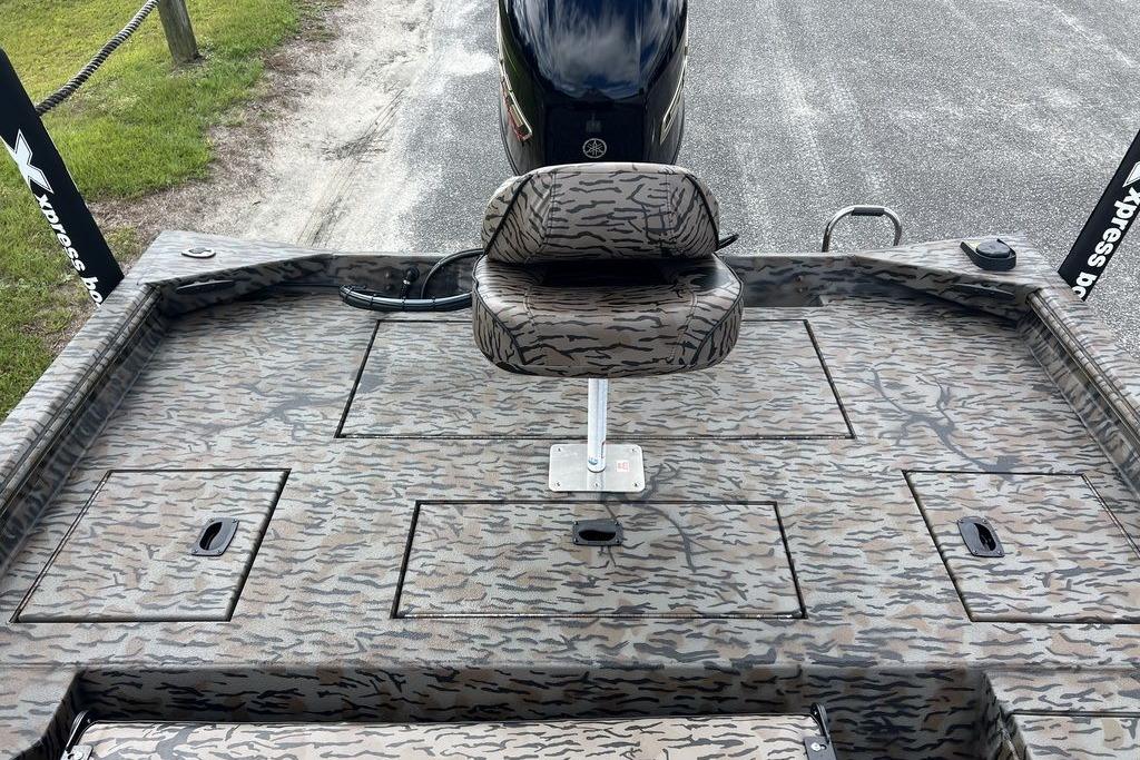 2026 Xpress XP200 boat deck with camo pattern and central seat.