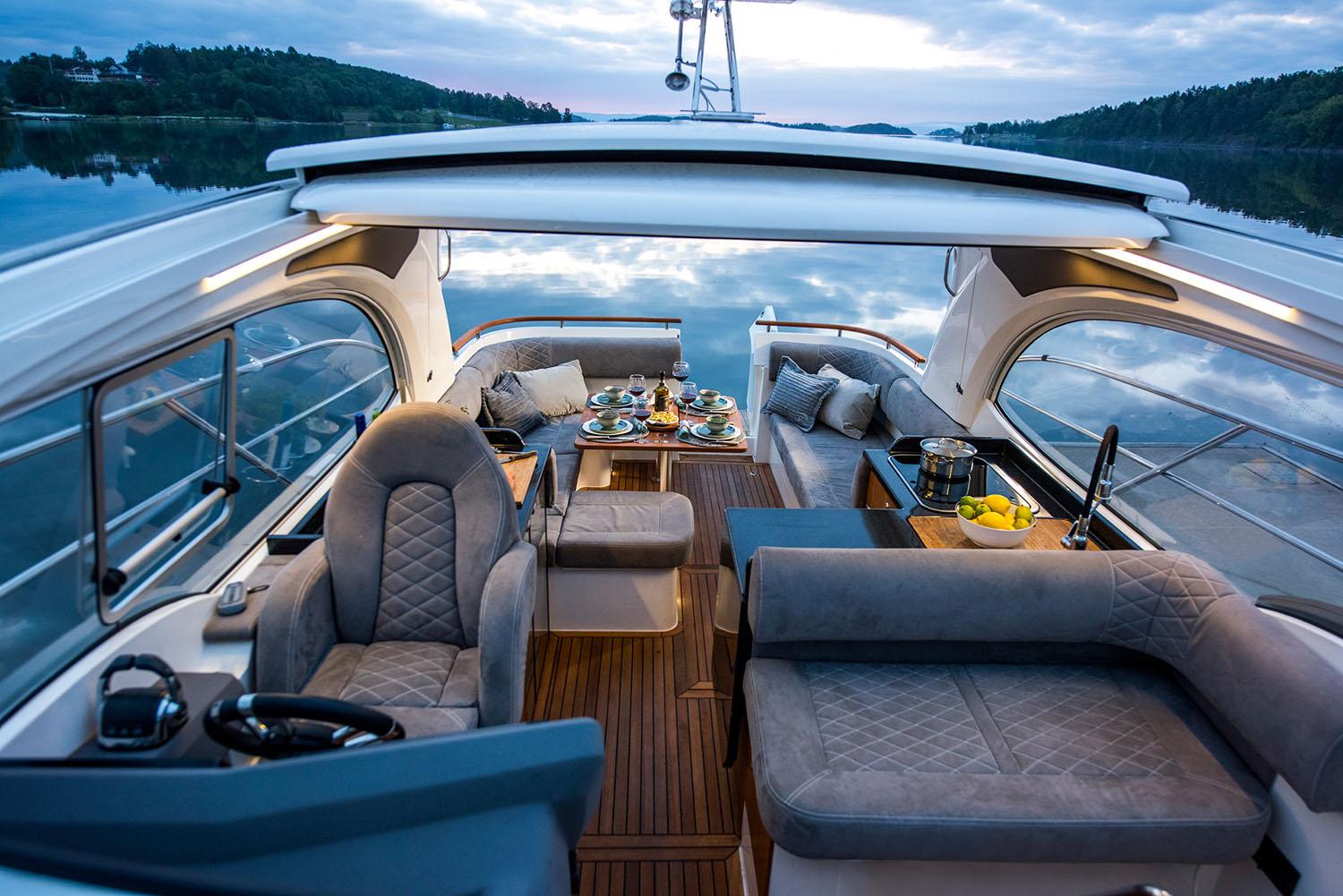 Manufacturer Provided Image: Luxurious interior of Marex 360 Cabriolet Cruiser 2026 on calm waters.