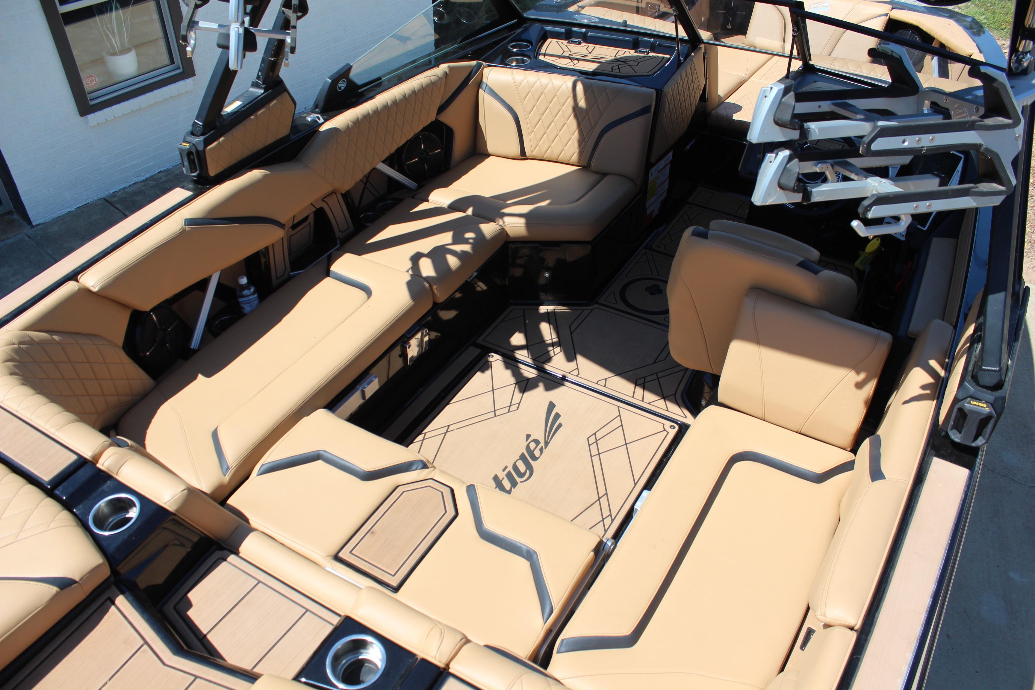 2022 Tigé 22RZX boat interior with tan seating and modern design.
