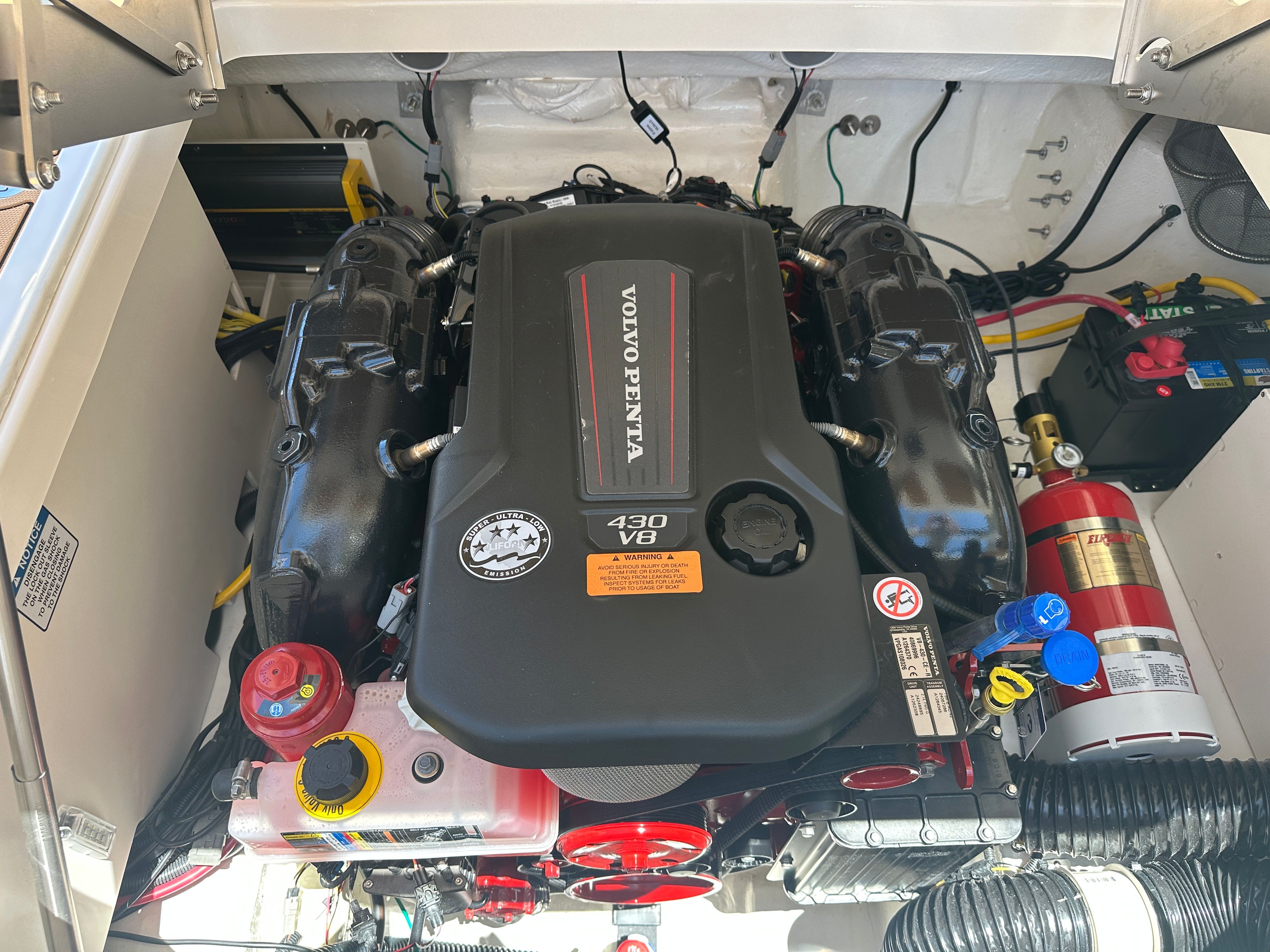 Engine compartment of a Chaparral 26 Surf boat with a Volvo Penta 430 V8 engine.