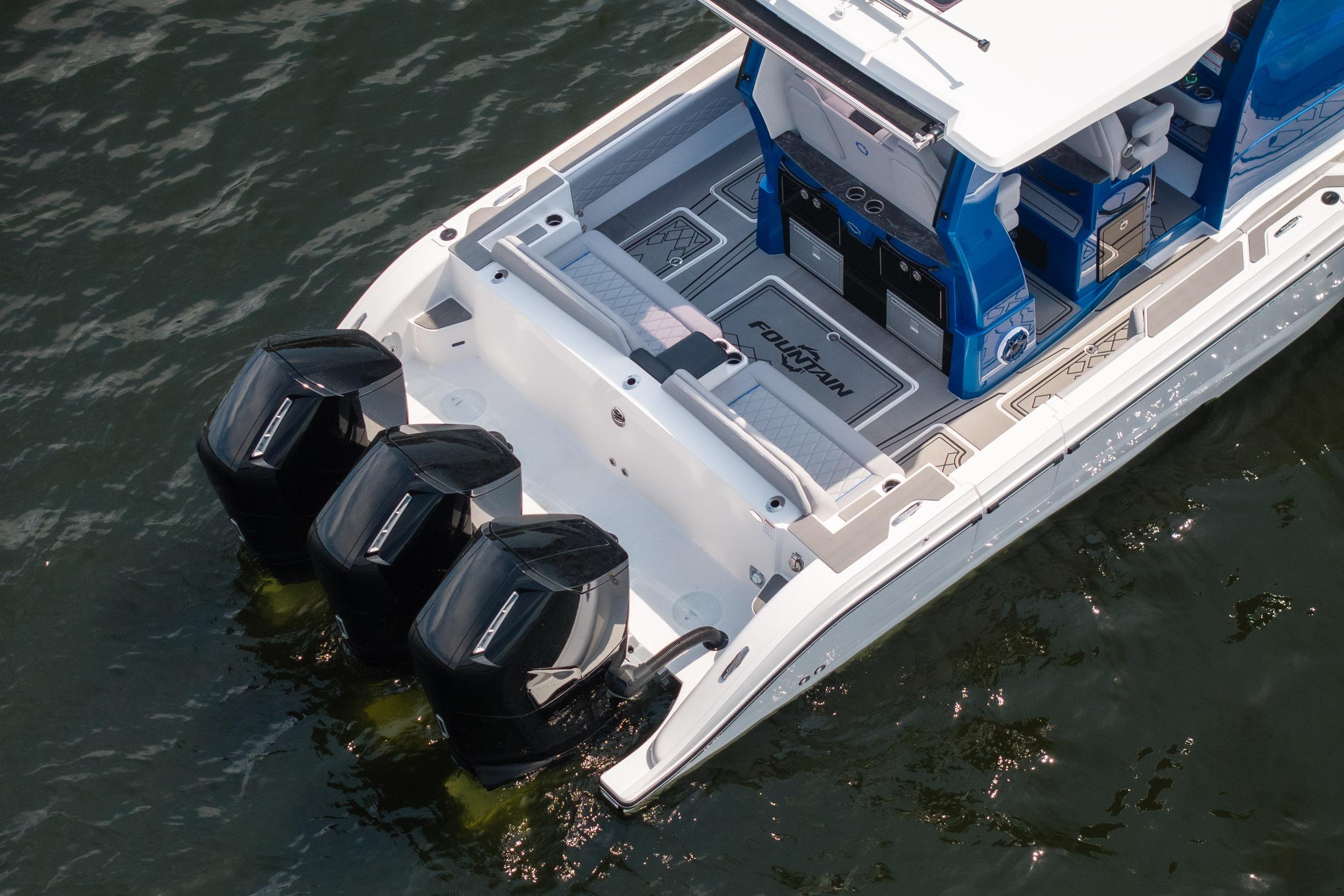 2026 Fountain 43 SCX boat with triple outboard engines on water.