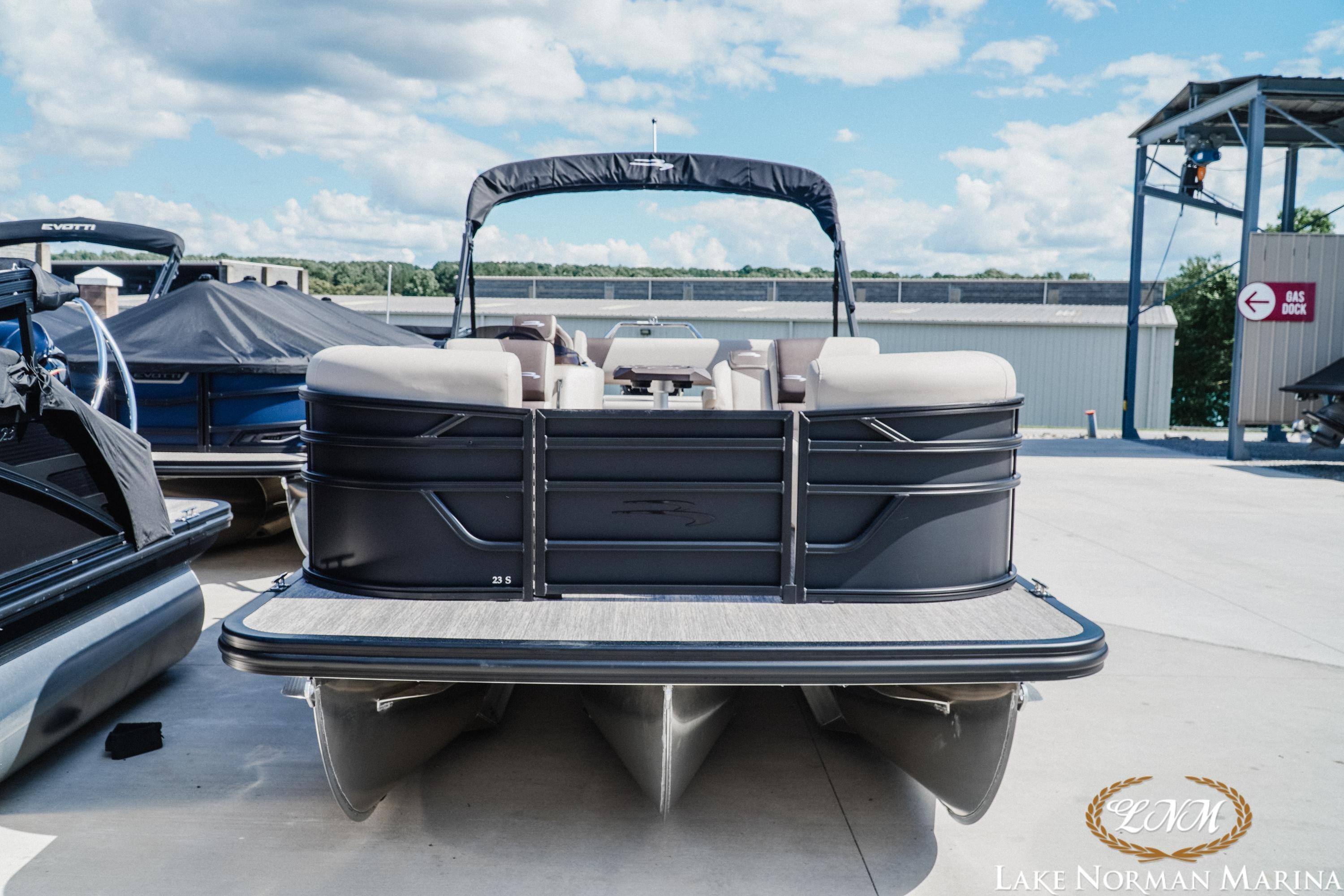 2027 Bennington 23ssb pontoon boat at Lake Norman Marina, featuring sleek design and spacious seating.