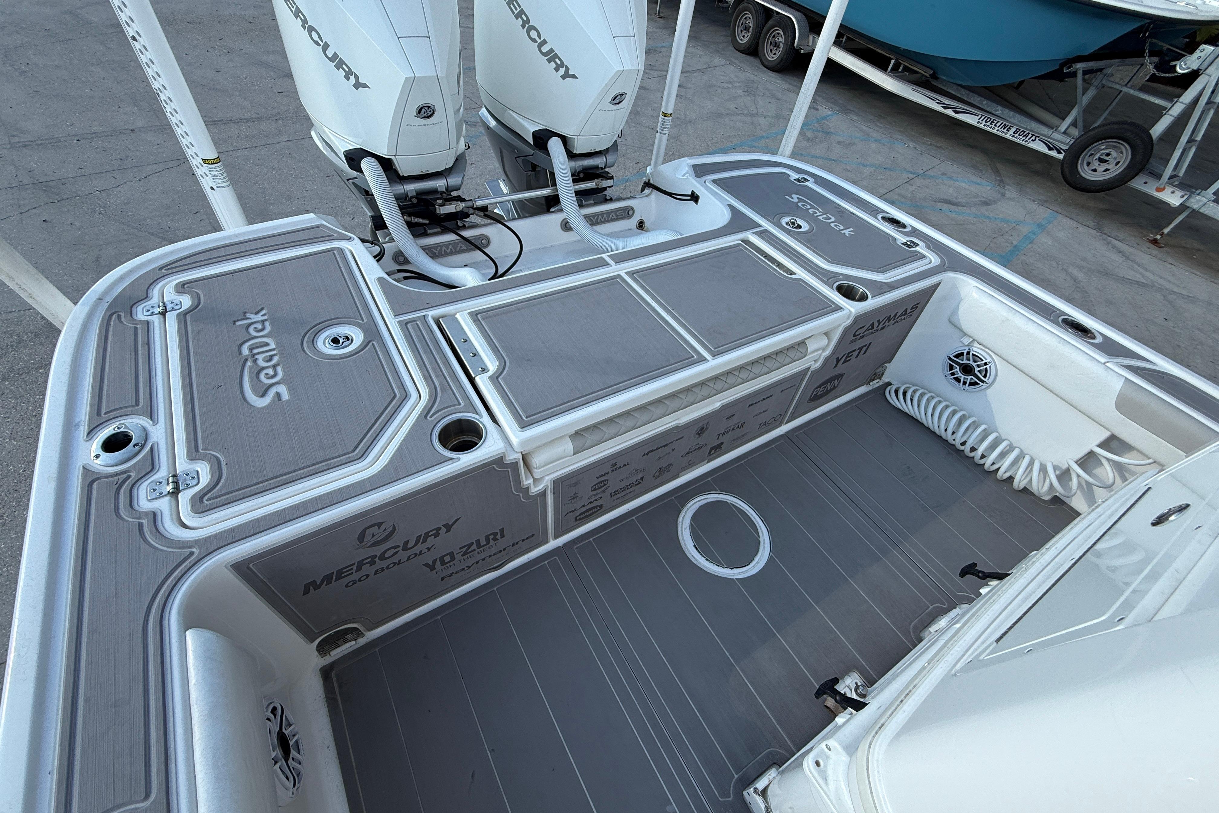 2022 Caymas 28 HB Twin boat deck with Mercury engines and SeaDek flooring.