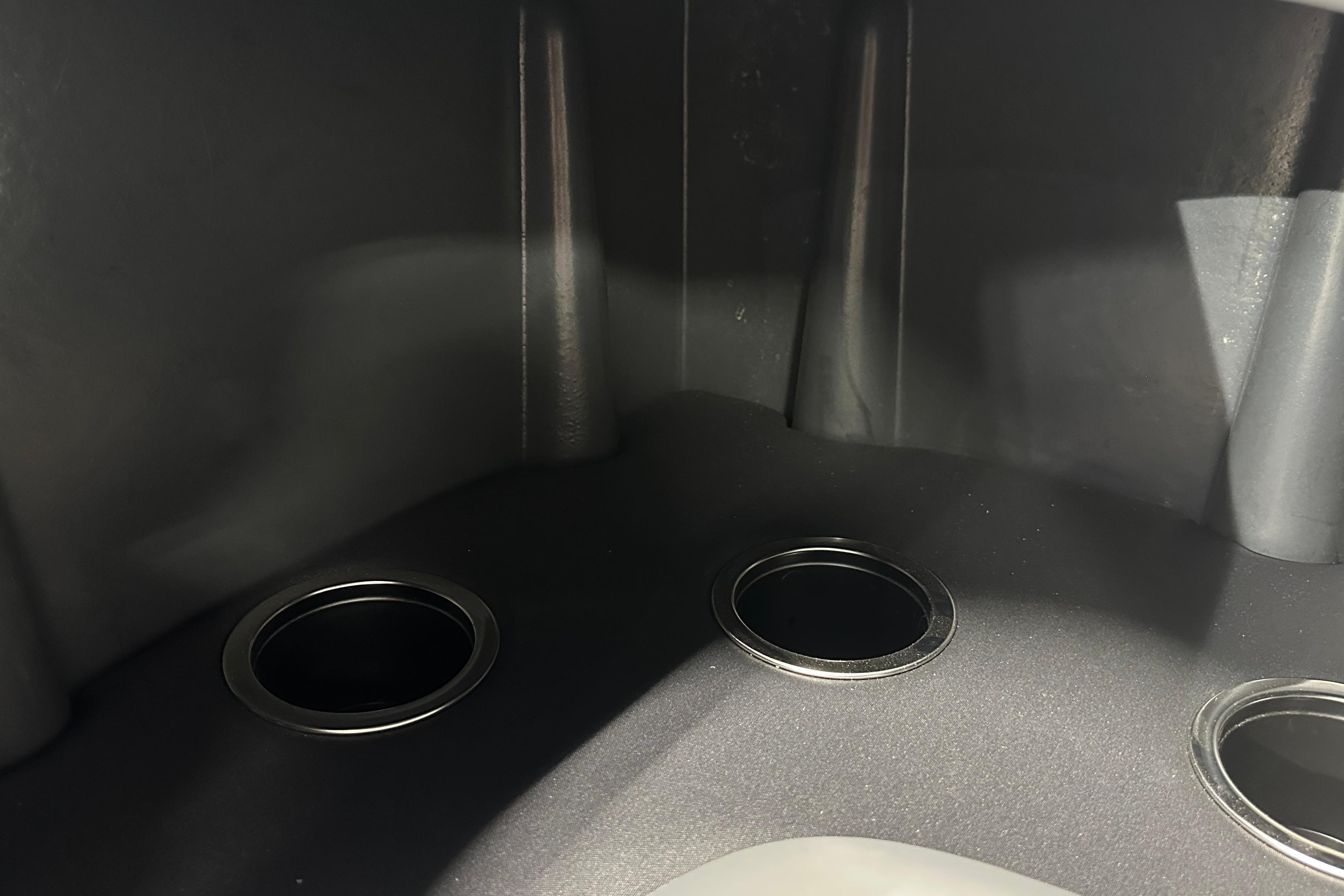 Interior view of 2026 Sun Tracker SportFish 22 DLX boat with cup holders.