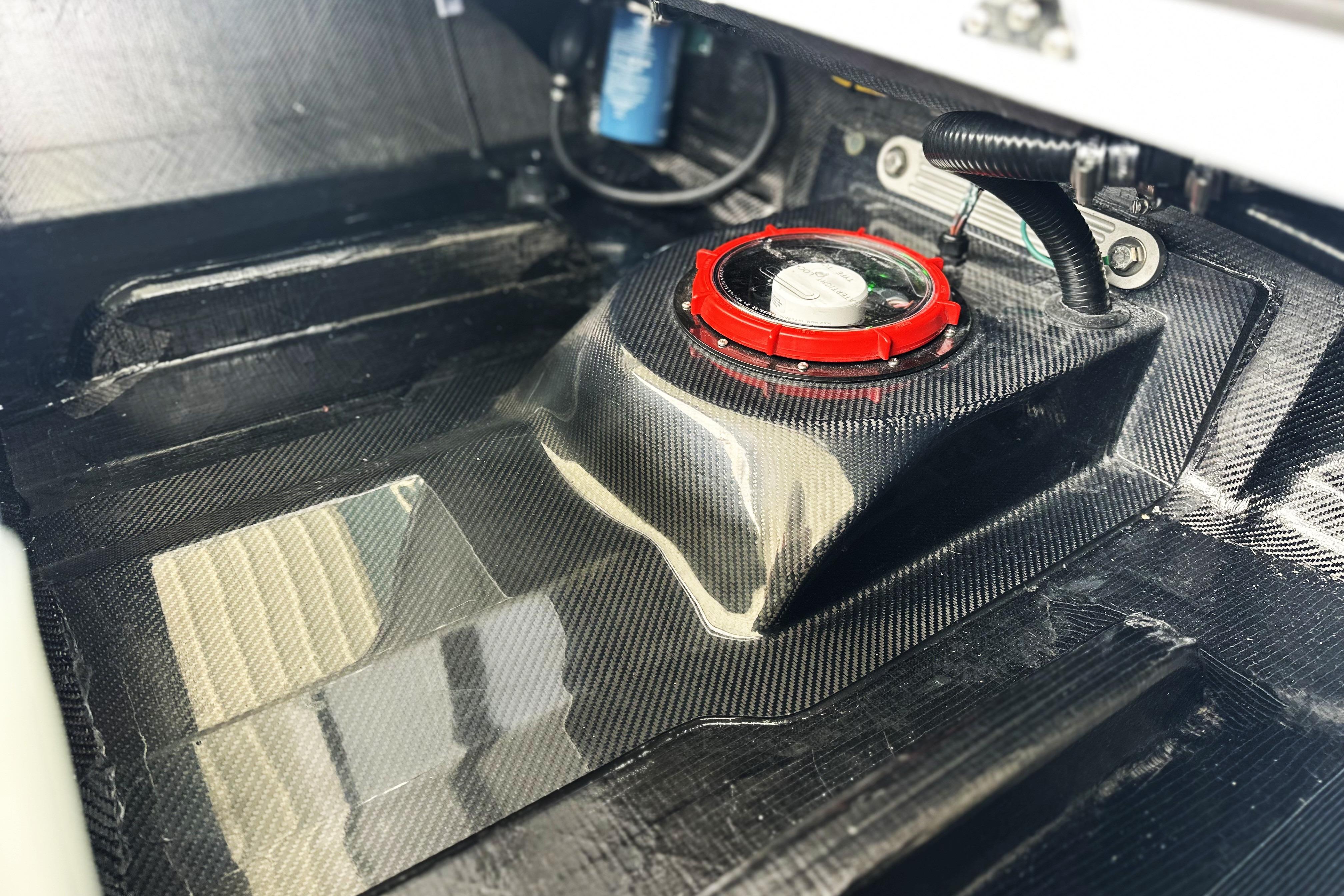 2026 Chittum Skiffs 18 Challenger 2.0 interior with carbon fiber detailing.