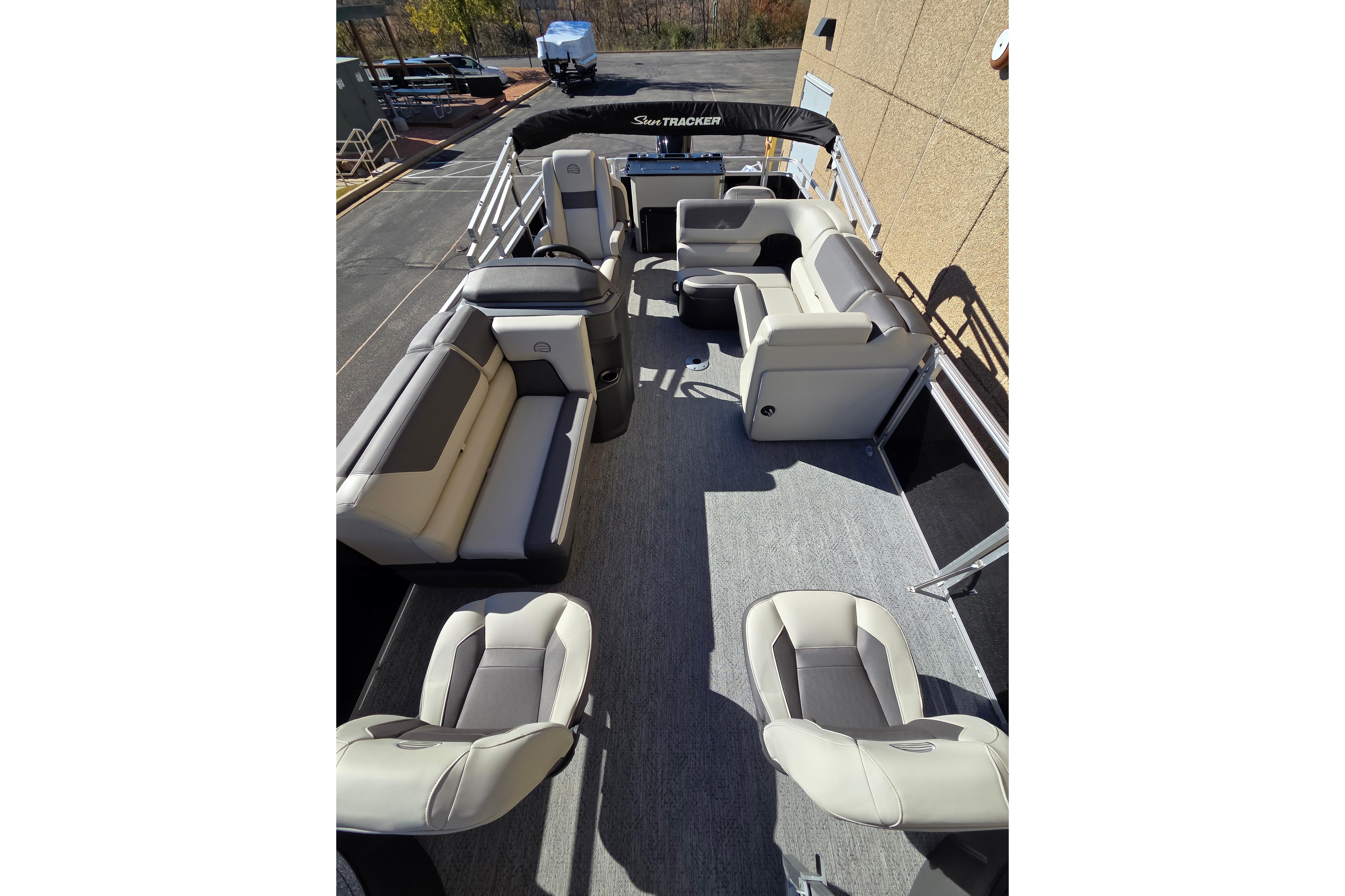 2026 Sun Tracker Fishin' Barge 20 DLX interior with spacious seating and modern design.