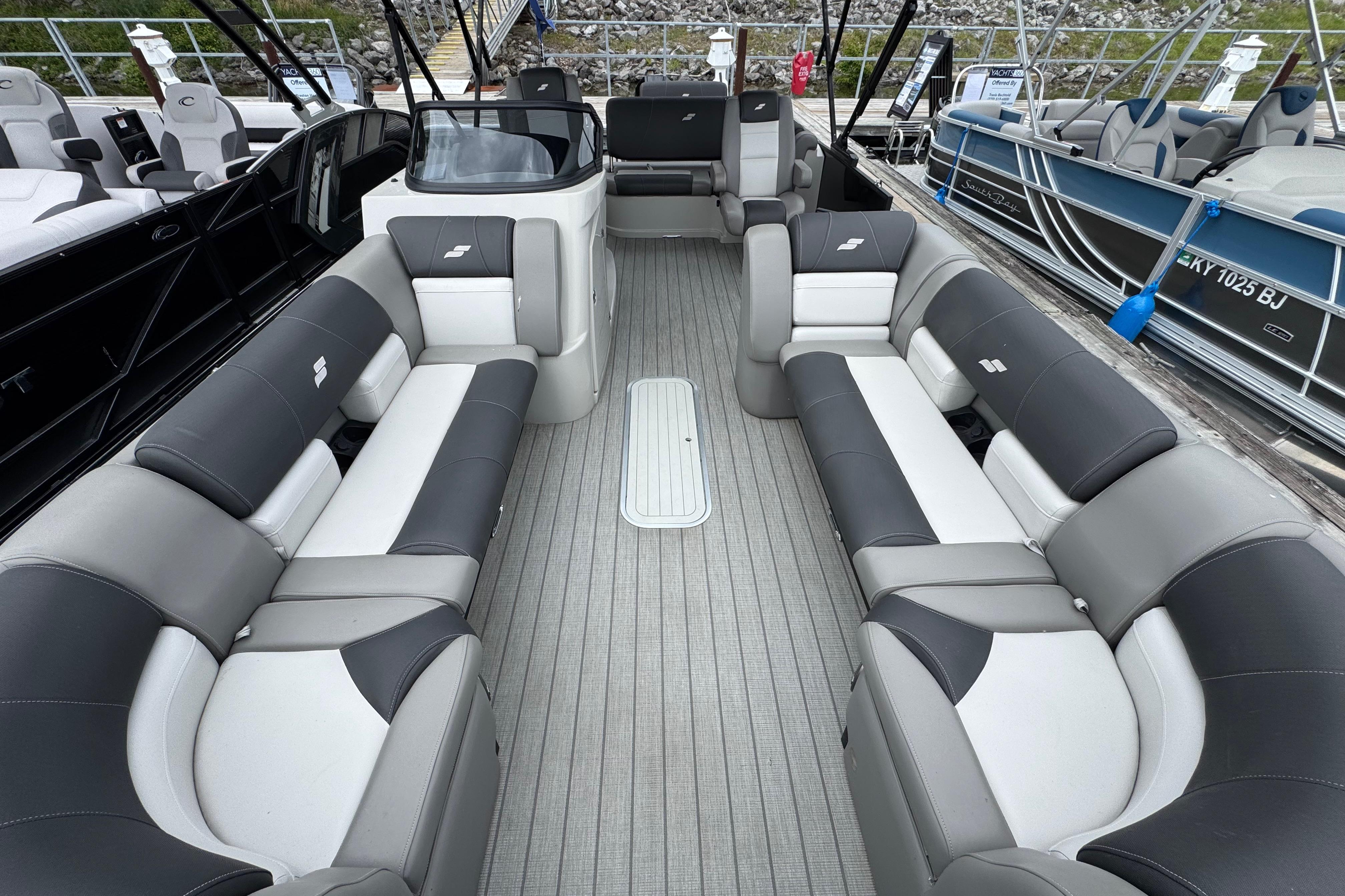 2023 Starcraft MX 25 DL DH pontoon boat with spacious seating and modern design.