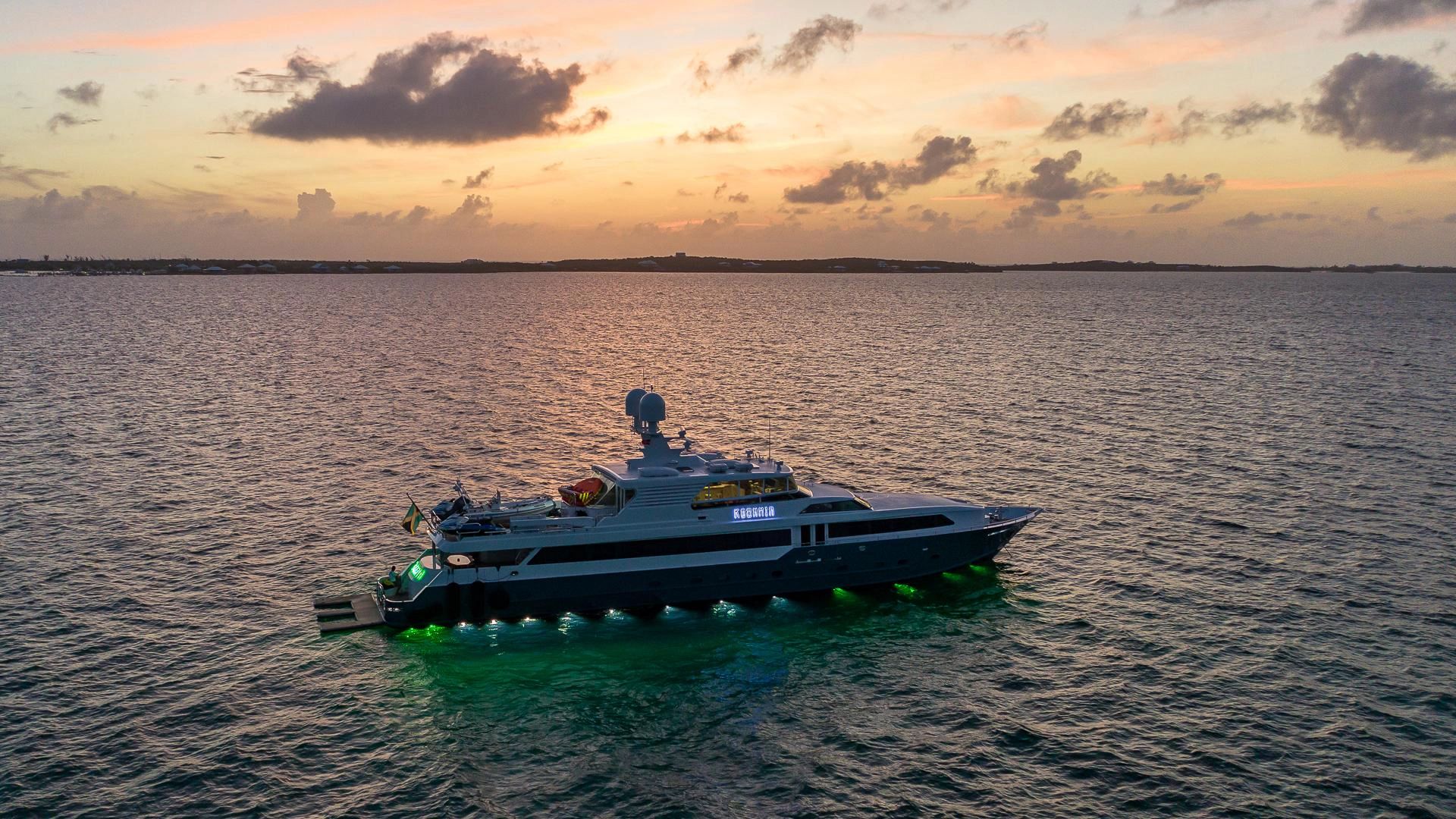 Luxury yacht Broward Raised Pilothouse 2008 at sunset on the sea.