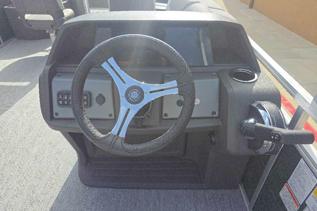 Steering console of 2026 Sun Tracker Fishin' Barge 20 DLX pontoon boat.
