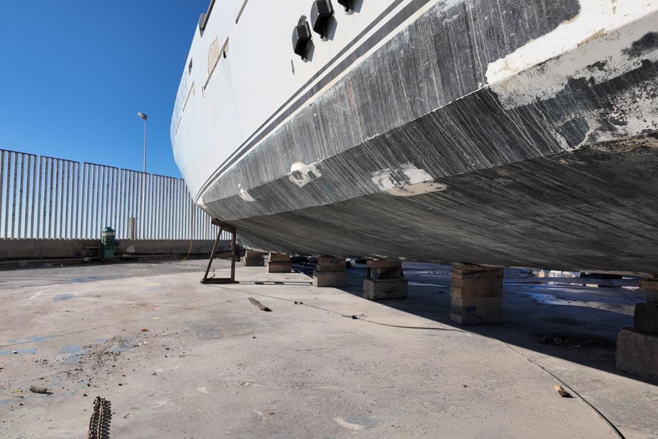 Dry-docked Custom Ocean Explorer 78 yacht, 2006 model, undergoing maintenance.