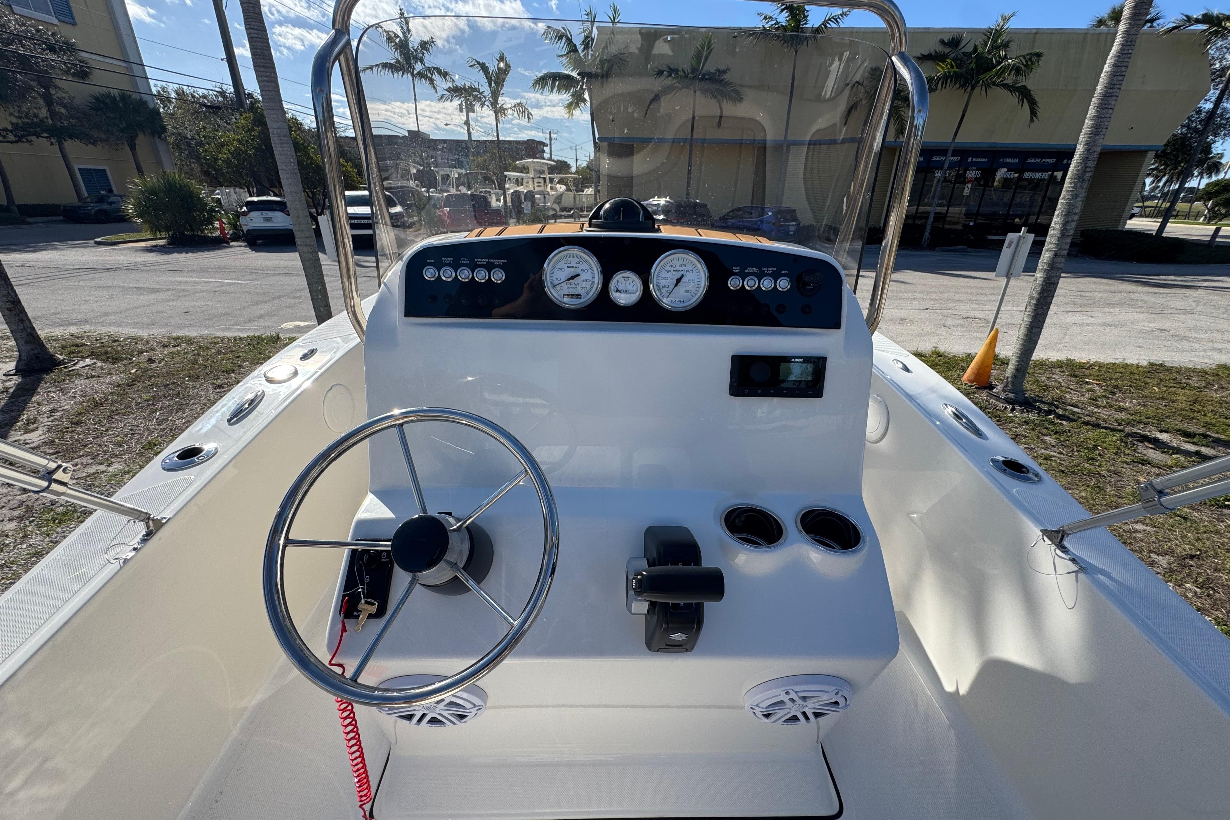 2026 Pioneer 180 Islander boat dashboard with steering wheel and controls.