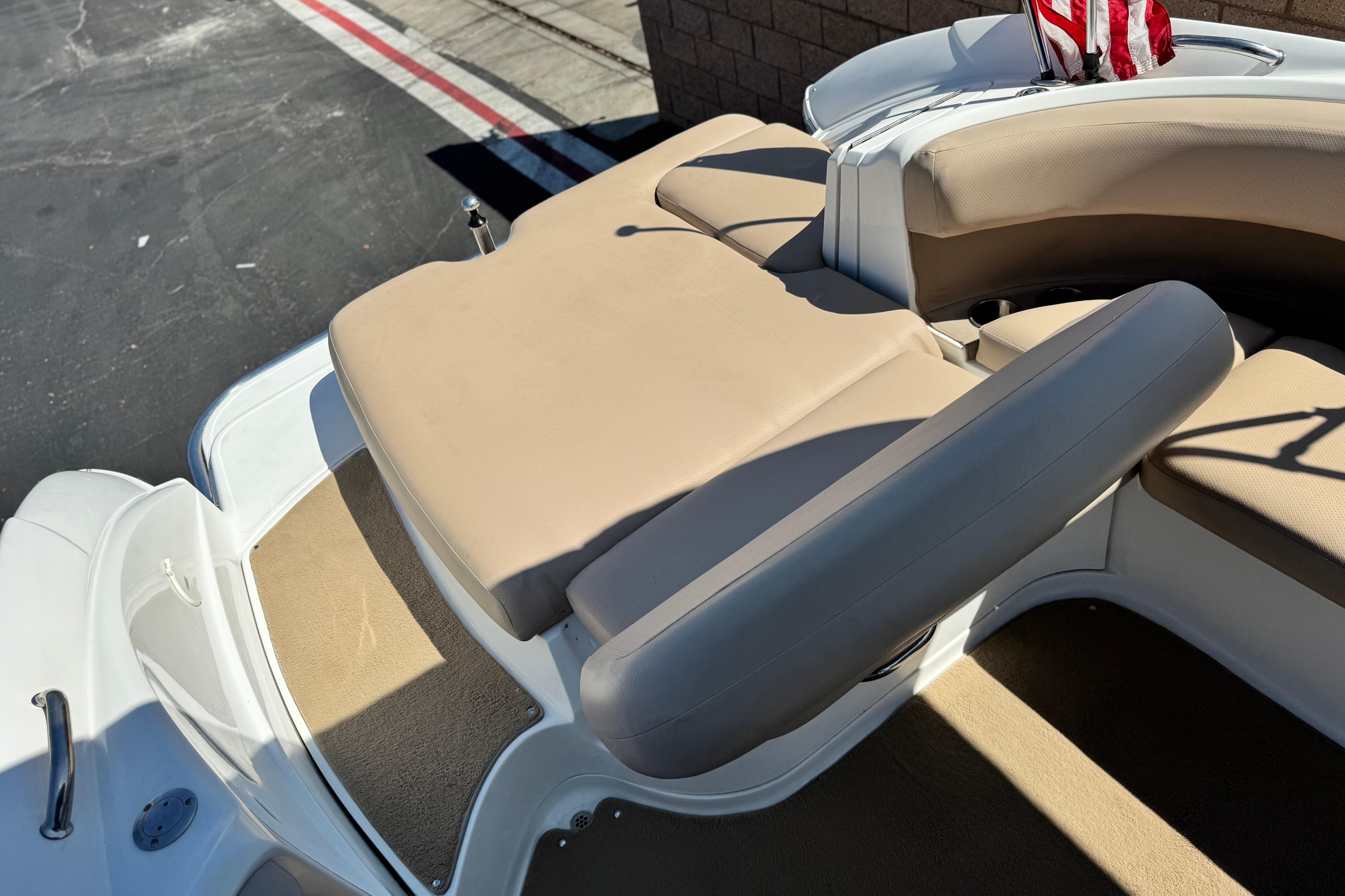 2008 Cobalt 262 boat interior with beige seating and American flag detail.