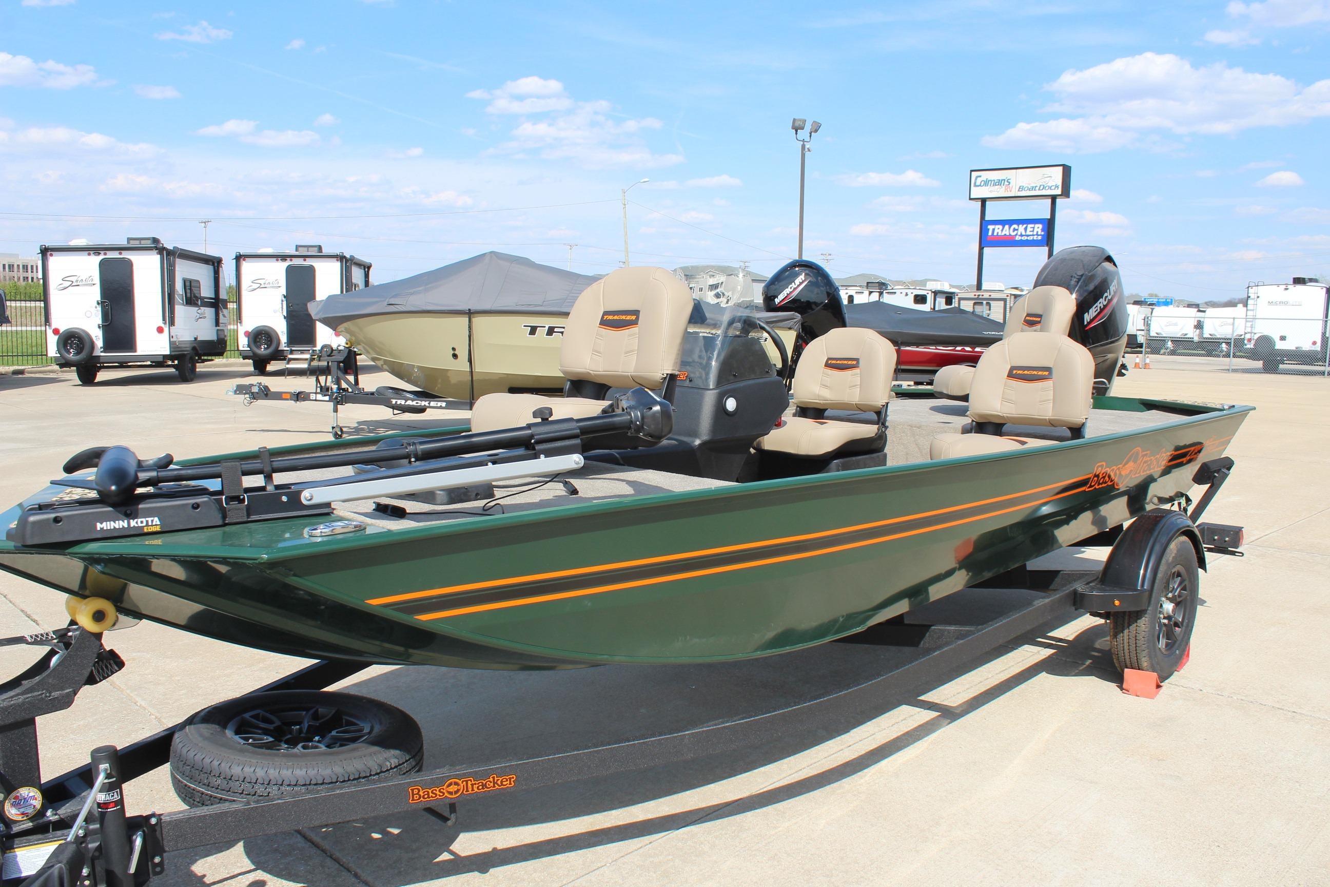 2026 Tracker Bass Tracker Classic Limited boat on trailer, displayed outdoors.