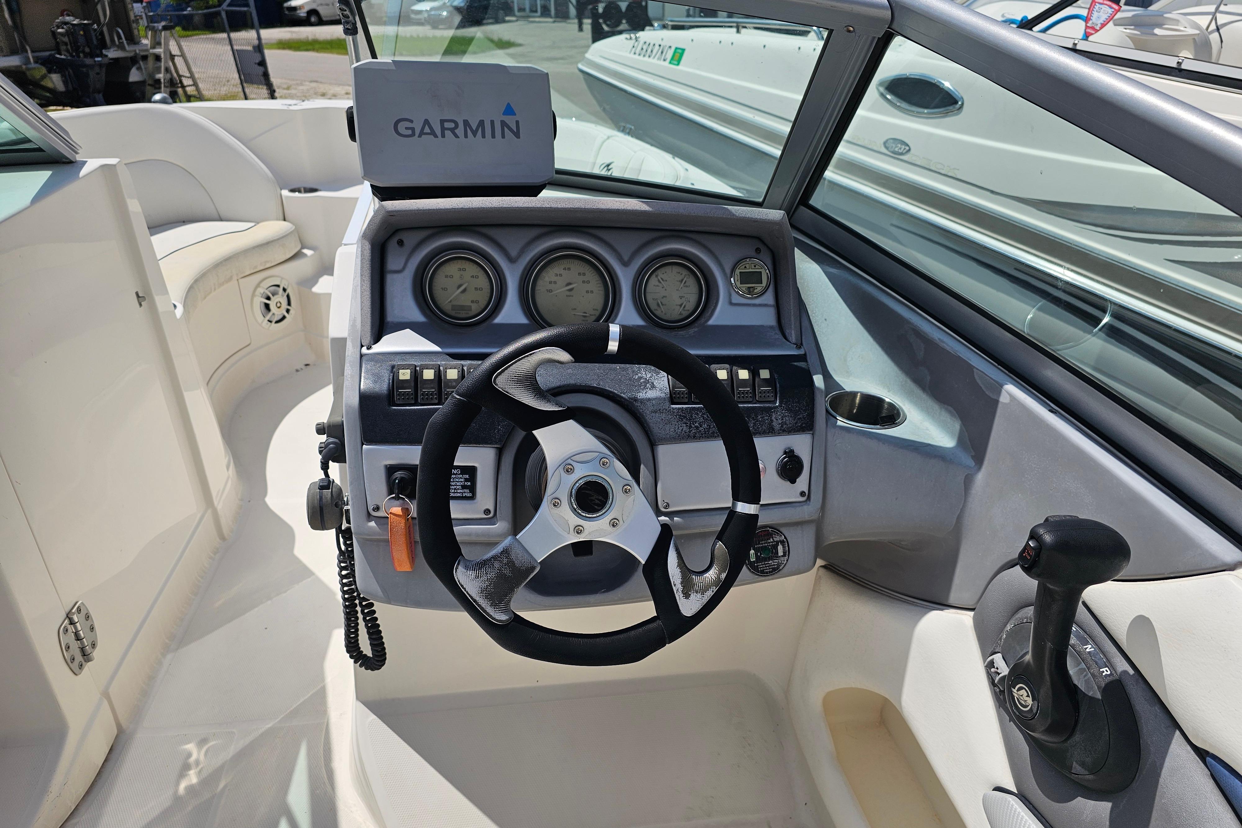 Cockpit of 2008 Monterey 220 Explorer boat with Garmin navigation system.