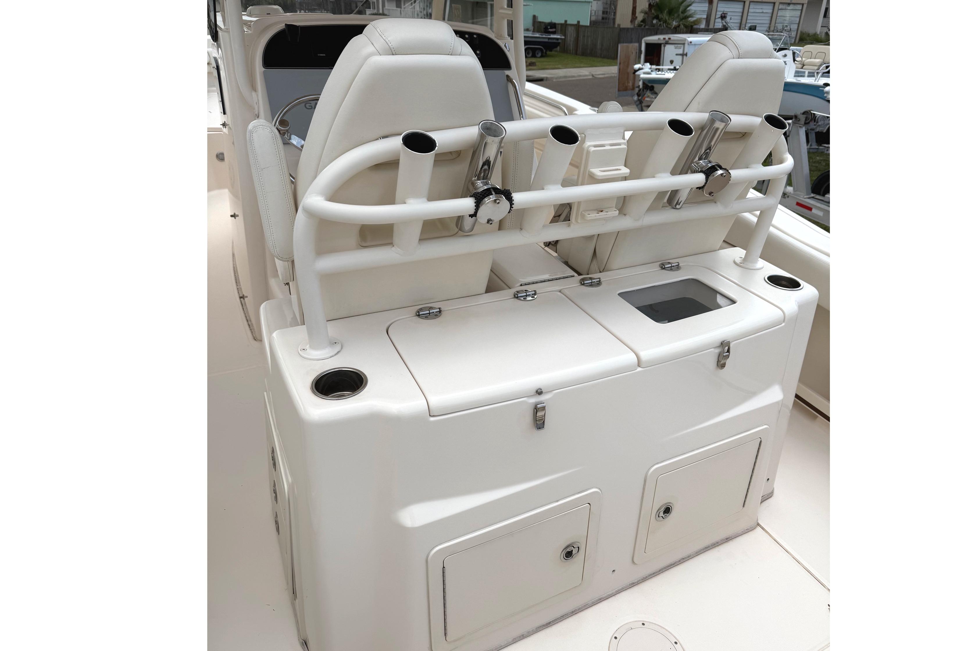 2018 Grady-White Canyon 306 boat interior with rod holders and storage compartments.