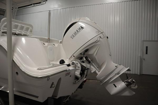 2025 Sea Fox 228 Commander boat with Yamaha outboard motor in a storage facility.