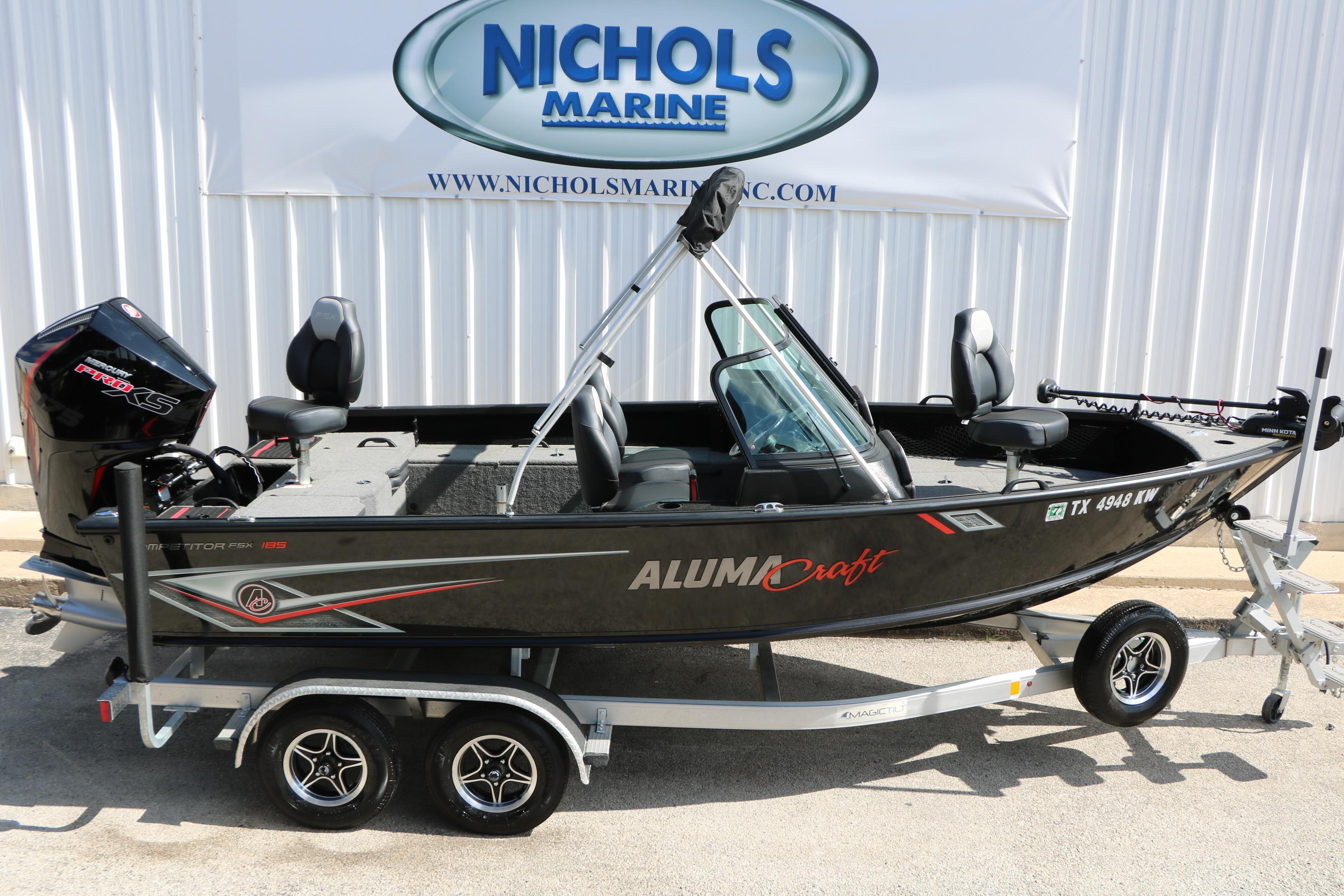 2023 Alumacraft Competitor FSX 185 boat on trailer at Nichols Marine dealership.