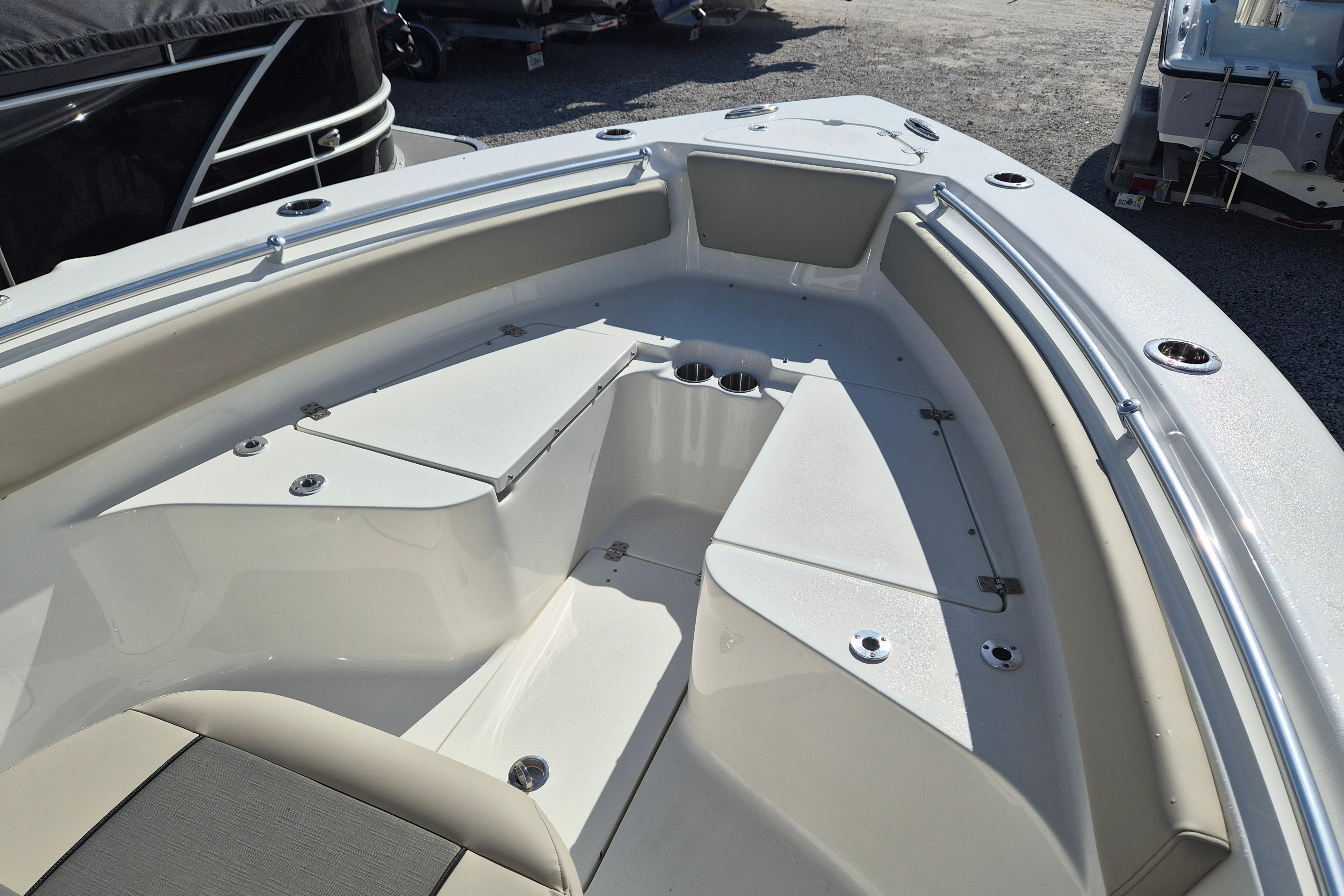 2026 Key West 239 FS boat interior with seating and storage compartments.