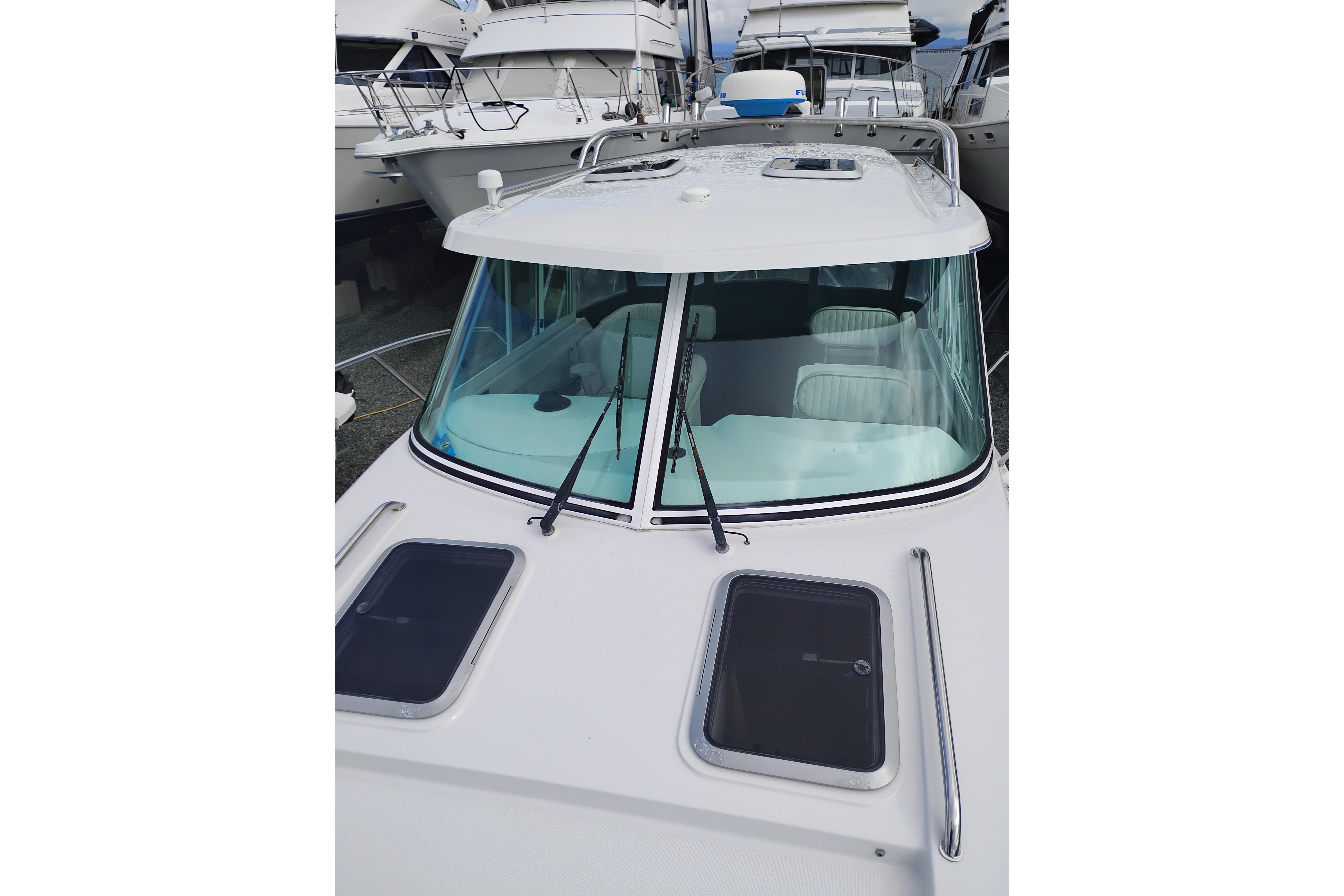 2007 Glacier Bay 2685 Coastal Runner boat with sleek design and spacious cabin.