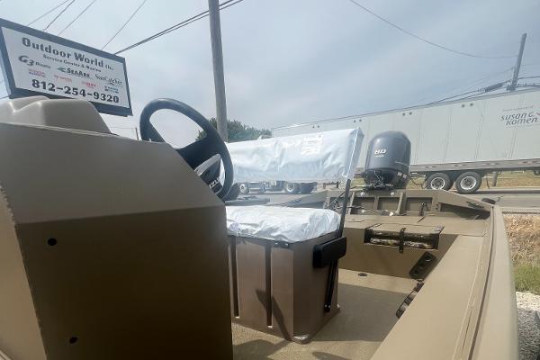 2025 G3 Gator Tough 18 CCJ boat interior with steering wheel and seating.