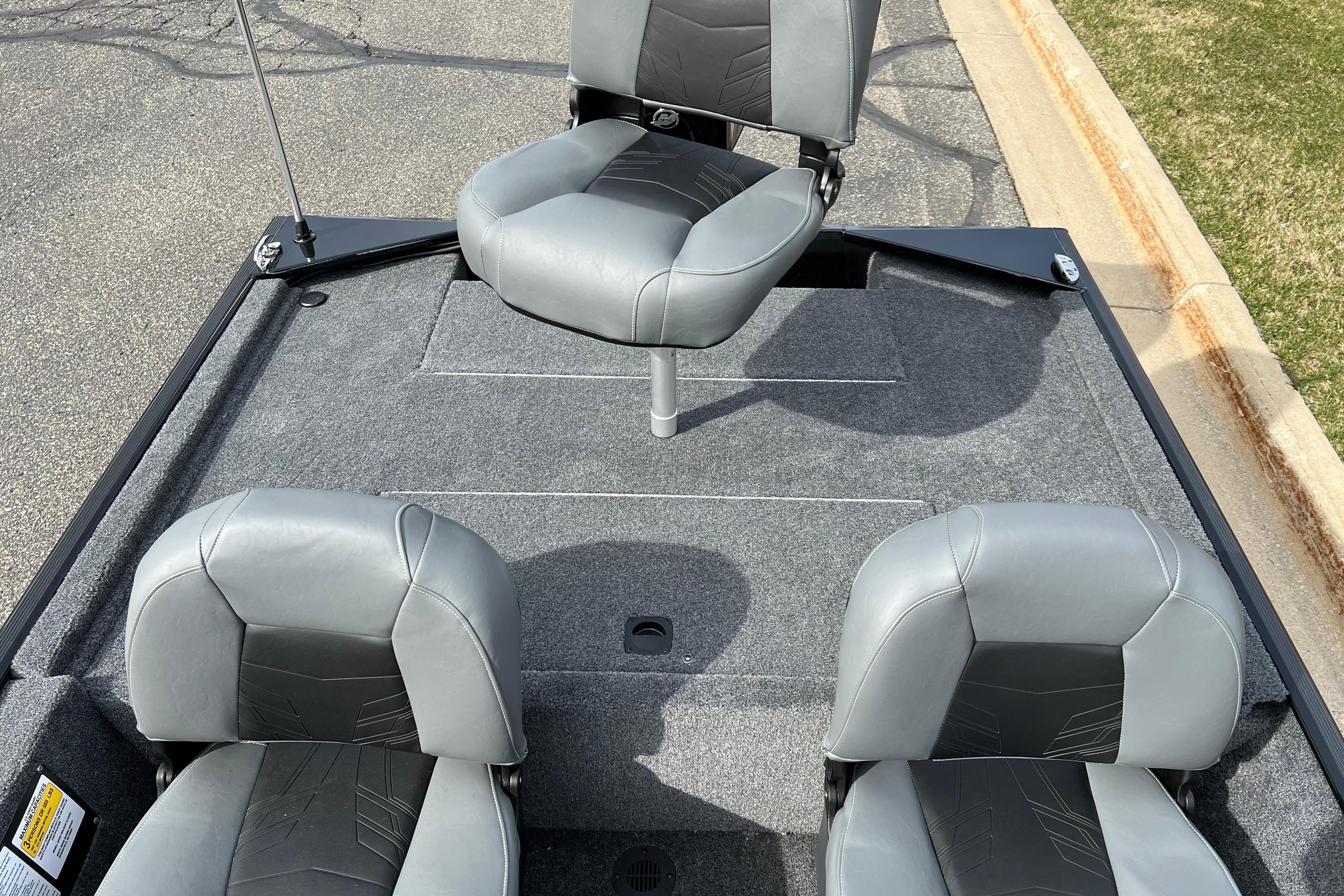 2026 Tracker Bass Tracker Classic XL boat with three gray seats on deck.