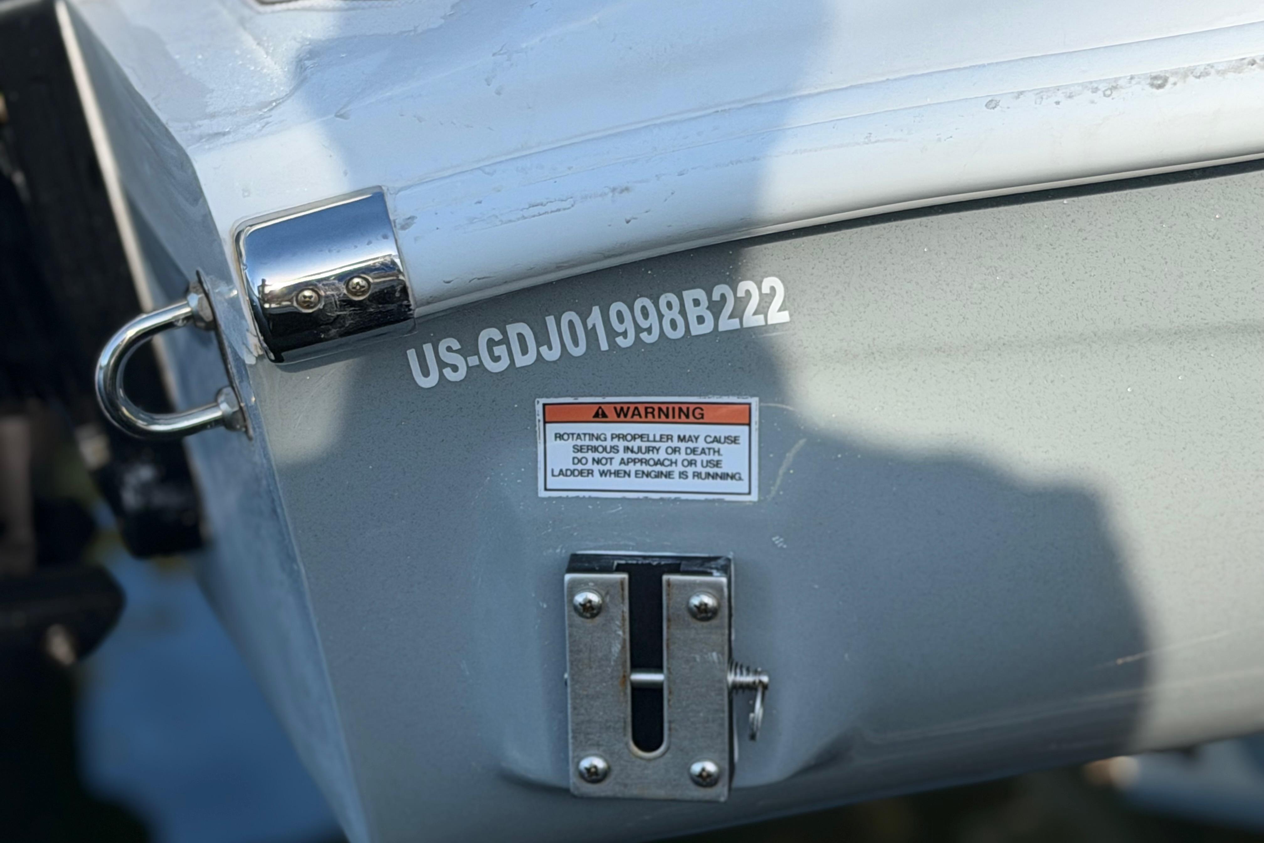 2022 Glasstream 328 Pro-XS boat stern with warning label and identification number.