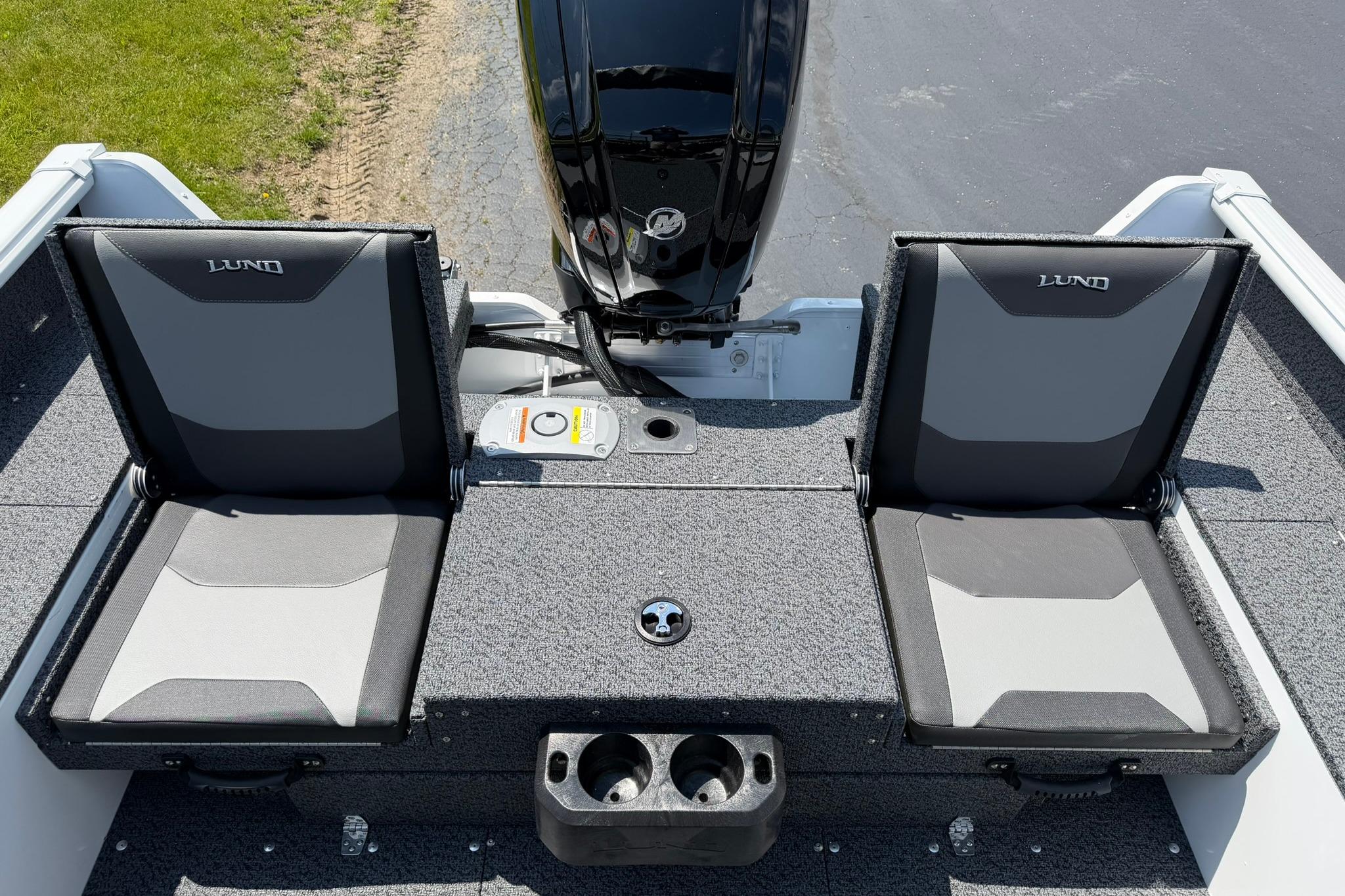 2027 Lund 1675 Adventure Sport boat seats with motor, featuring gray and black design.