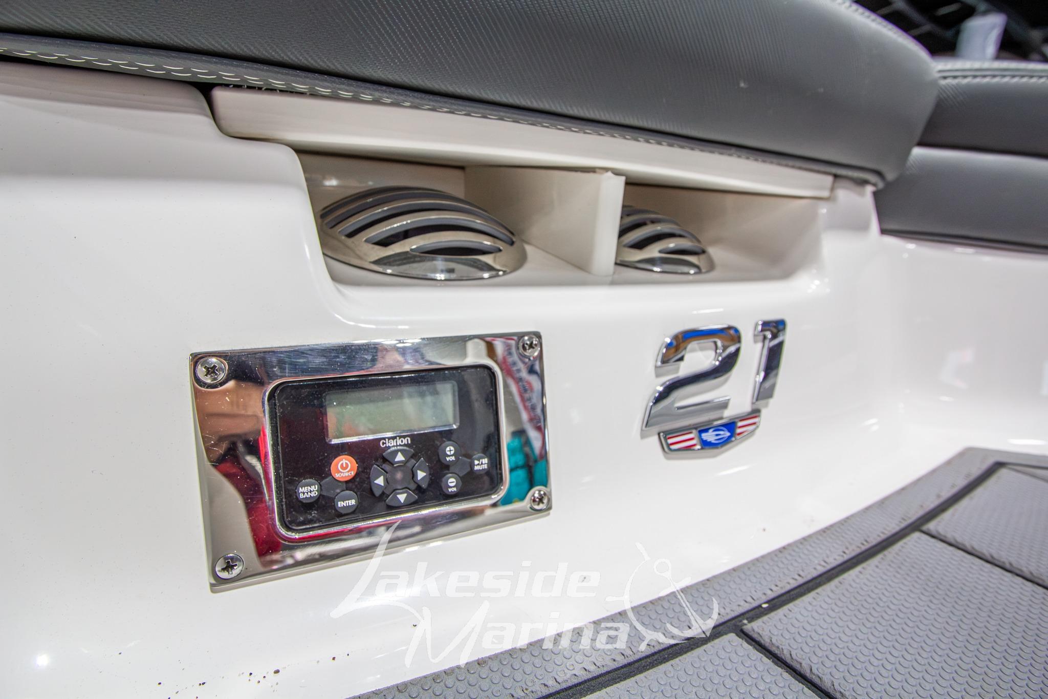 2022 Chaparral 21 SSi boat interior with audio controls and branding details.