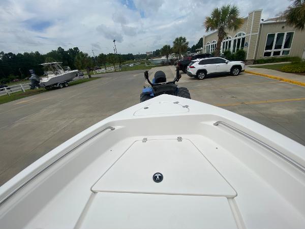 2024 Key West 189 FS boat on trailer in parking lot.